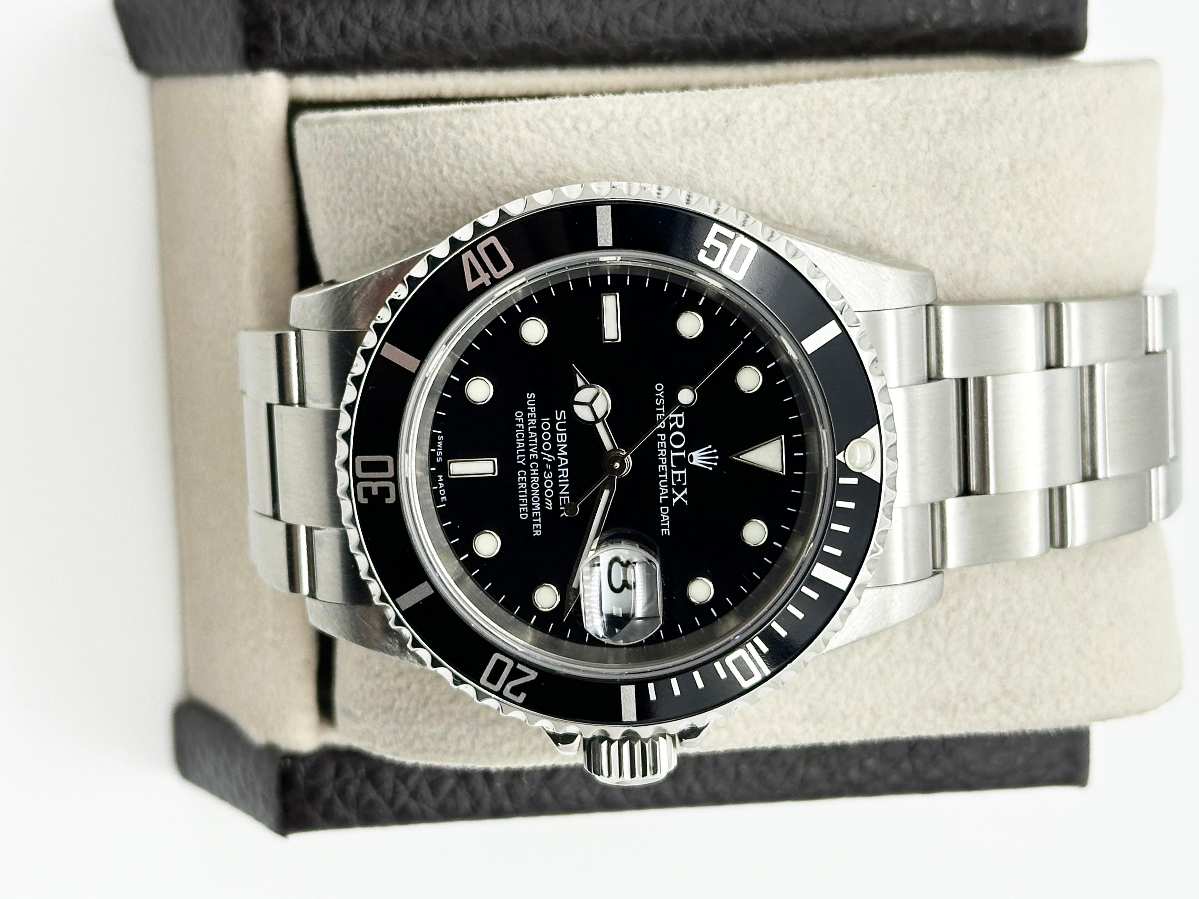 Rolex 16610 Submariner Date Schwarzes Zifferblatt Edelstahl 2005 Box Papier für Damen oder Herren