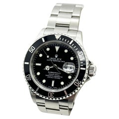 Rolex 16610 Submariner Date Schwarzes Zifferblatt Edelstahl 2005 Box Papier