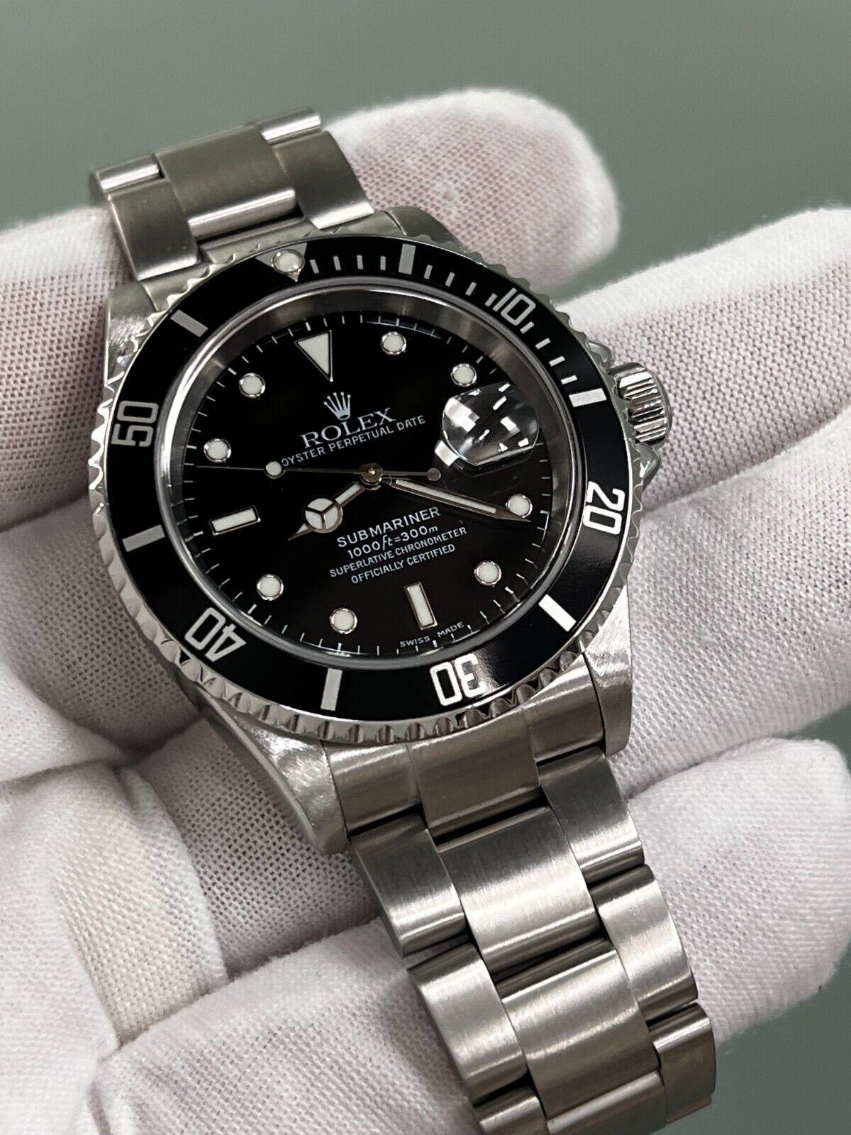 Rolex 16610 Submariner Date Black Stainless 2003 Boîte et papiers d'origine en vente 2