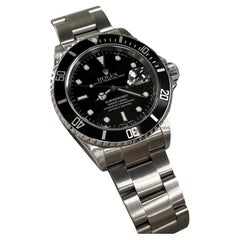 Used Rolex 16610 Submariner Date Black Stainless 2003 Box Papers