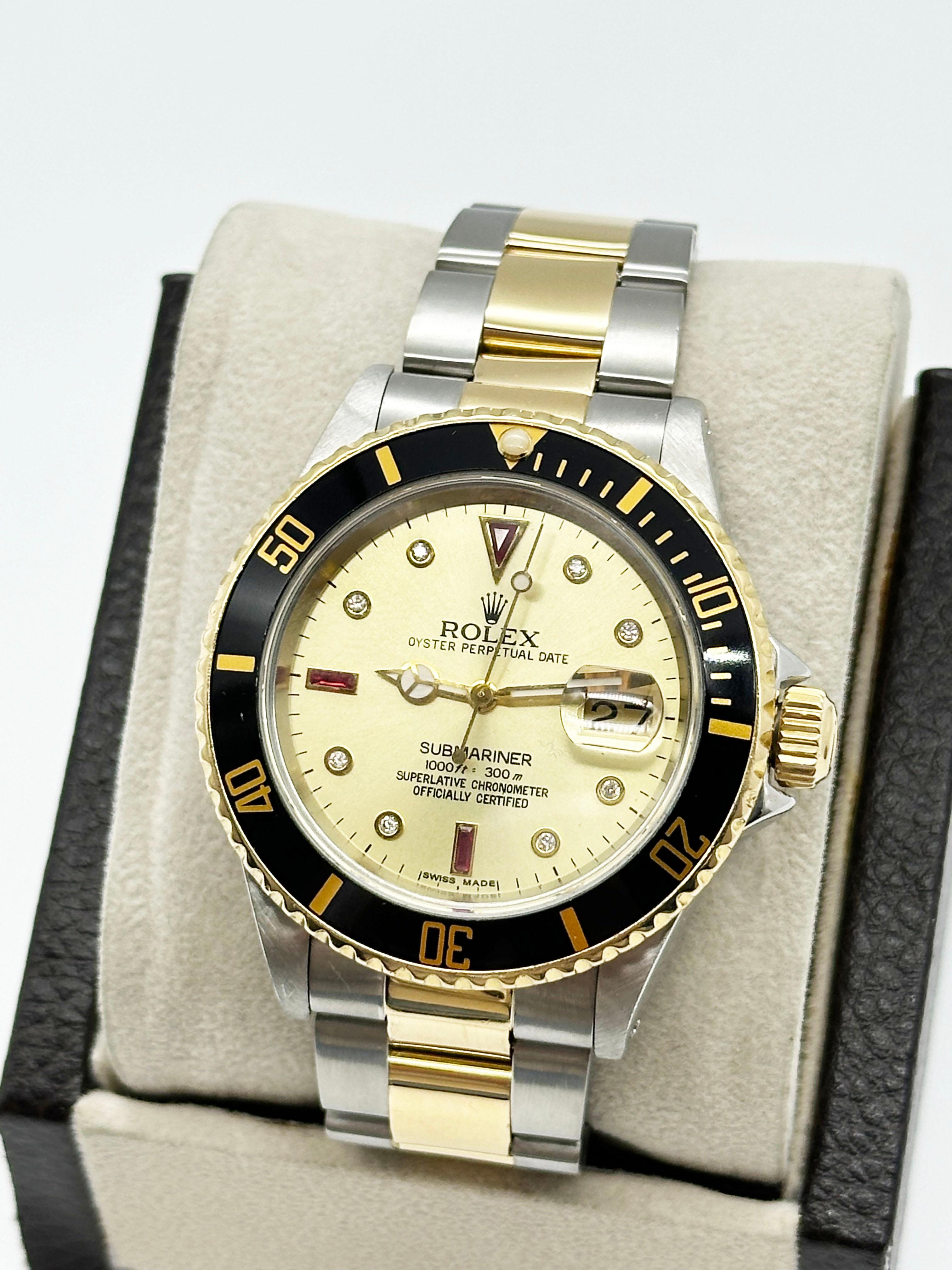 Rolex 16613 Schwarzer Submariner Champagner Serti Rubin Diamant Zifferblatt 18K Gold & Stahl Herren