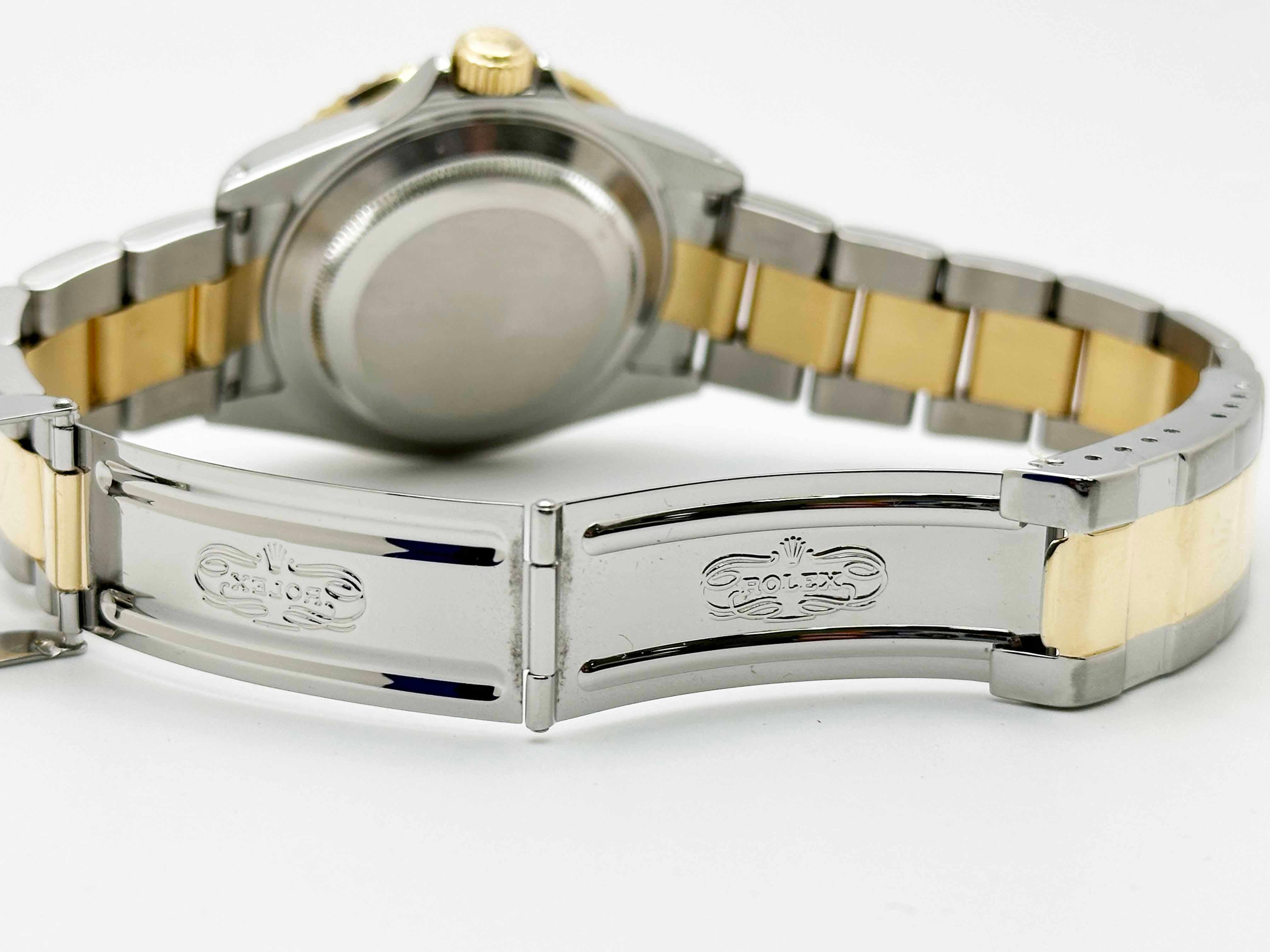 Rolex 16613 Submariner Blaues Zifferblatt 18K Gelbgold Edelstahl 2002 1