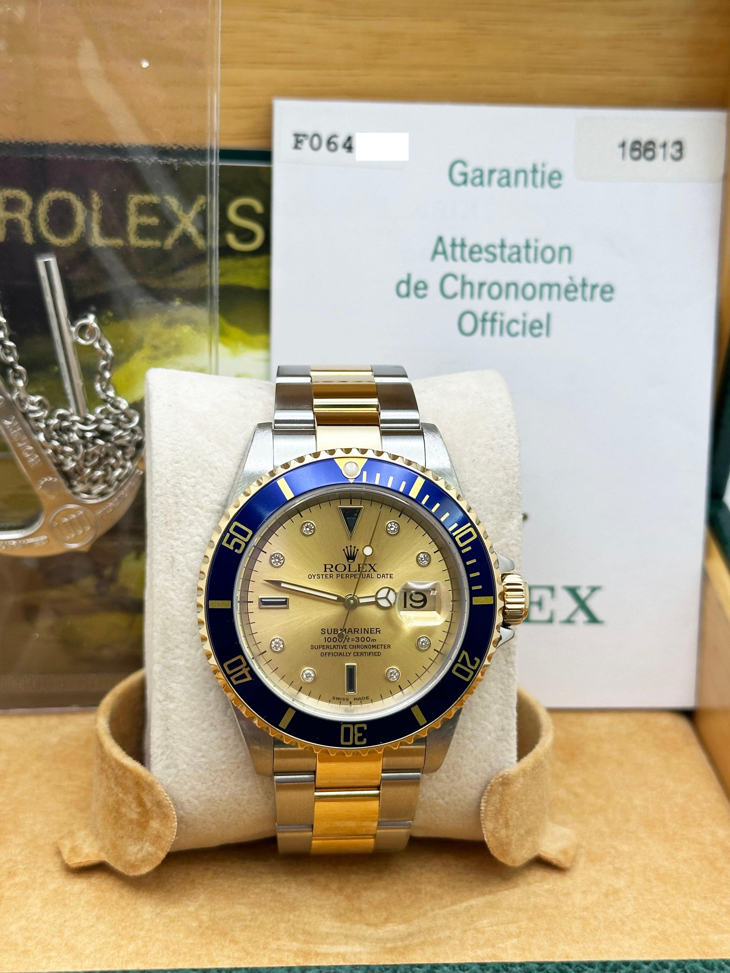 Style Number: 16613



Serial: F064***



Year: 2004

 

Model: Submariner

 

Case Material: Stainless Steel 

 

Band: 18K Yellow Gold & Stainless Steel 

 

Bezel: Blue 

 

Dial: Champagne Serti Dial 

 

Face: Sapphire Crystal 

 

Case Size: