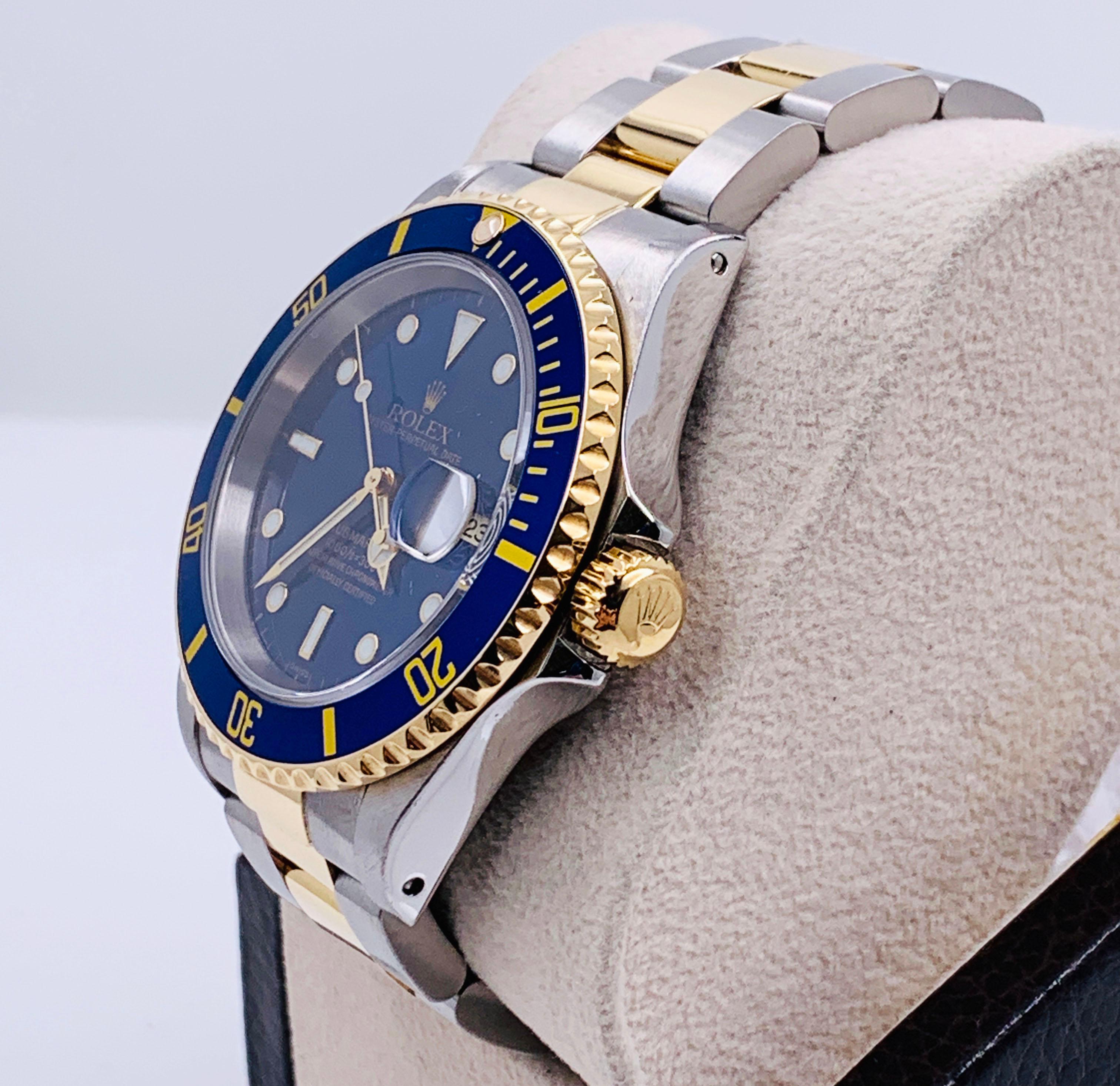 Style Number: 16613

 

Serial: A511***


Year: 1999

 

Model: Submariner 

 

Case Material: Stainless Steel 

 

Band: 18K Yellow Gold and Stainless Steel 

 

Bezel: 18K Yellow Gold and Blue  

 

Dial: Blue 

 

Face: Sapphire Crystal 

 

Case