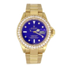 Rolex 16618 Submariner Diamond Bezel Blue Dial Watch