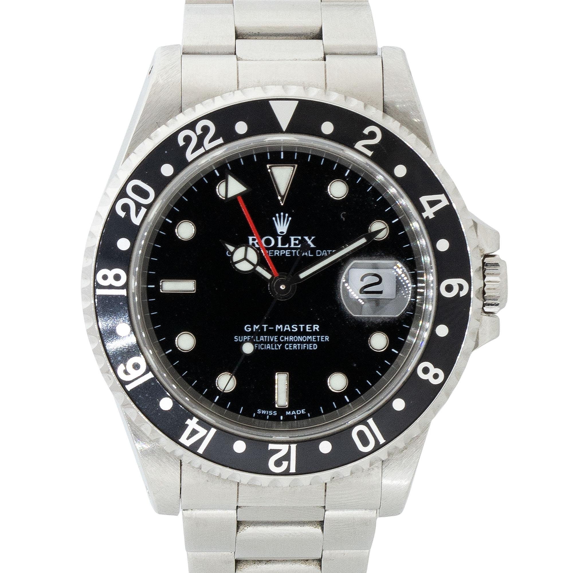 The Rolex 16700 GMT-Master Stainless Steel Black Dial Watch is a classic timepiece renowned for its timeless design and functionality. Crafted from durable stainless steel, this watch features a striking black dial that exudes sophistication. As