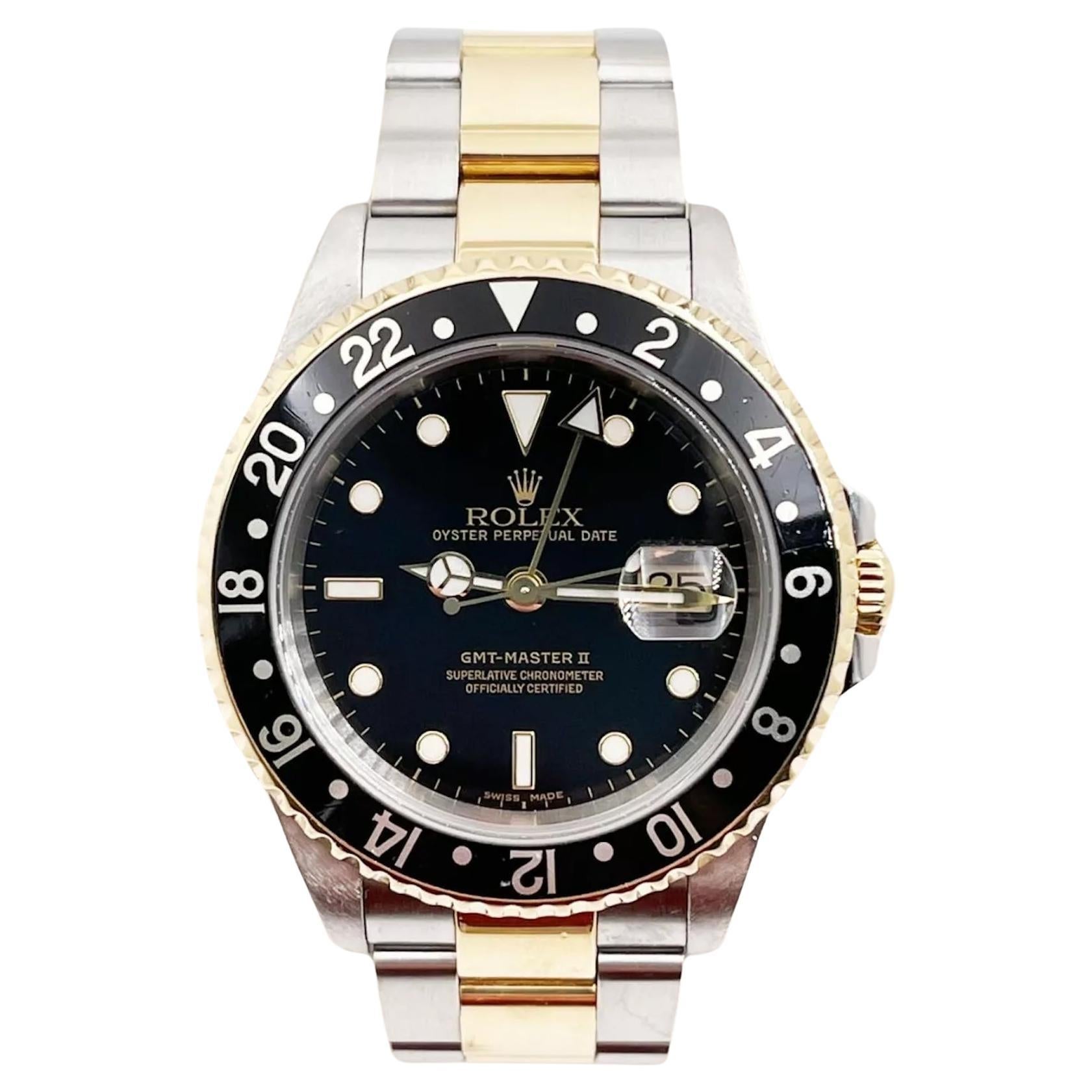 Rolex GMT Master II 16713 40mm Black Dial 18K Yellow Gold Steel Box Paper 2001