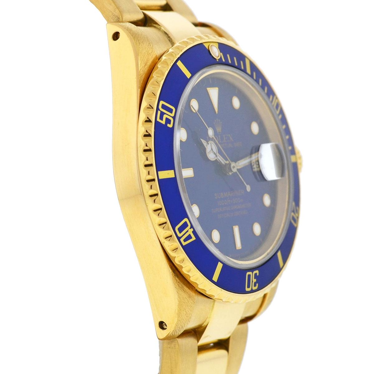 Women's or Men's Rolex 16808 Submariner 18 Karat Yellow Gold Blue Dial Automatic Men's Watch