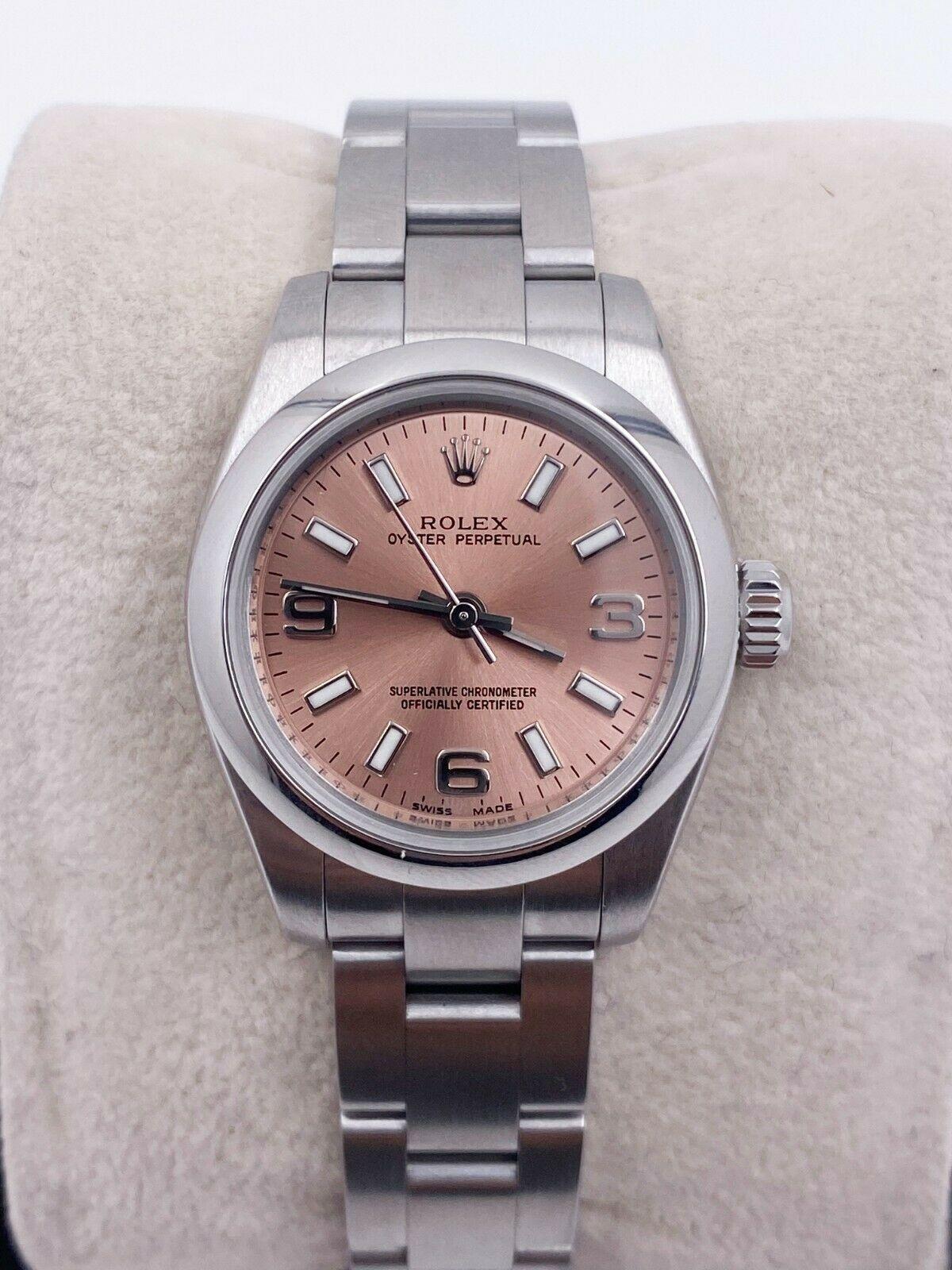Style Number: 176200

 

Serial: G072***


Year: 2010

 

Model: Ladies Oyster Perpetual 

 

Case Material: Stainless Steel 

 

Band: Stainless Steel 

 

Bezel:  Stainless Steel Smooth Bezel 

 

Dial: Pink / Salmon 

 

Face: Sapphire Crystal 

