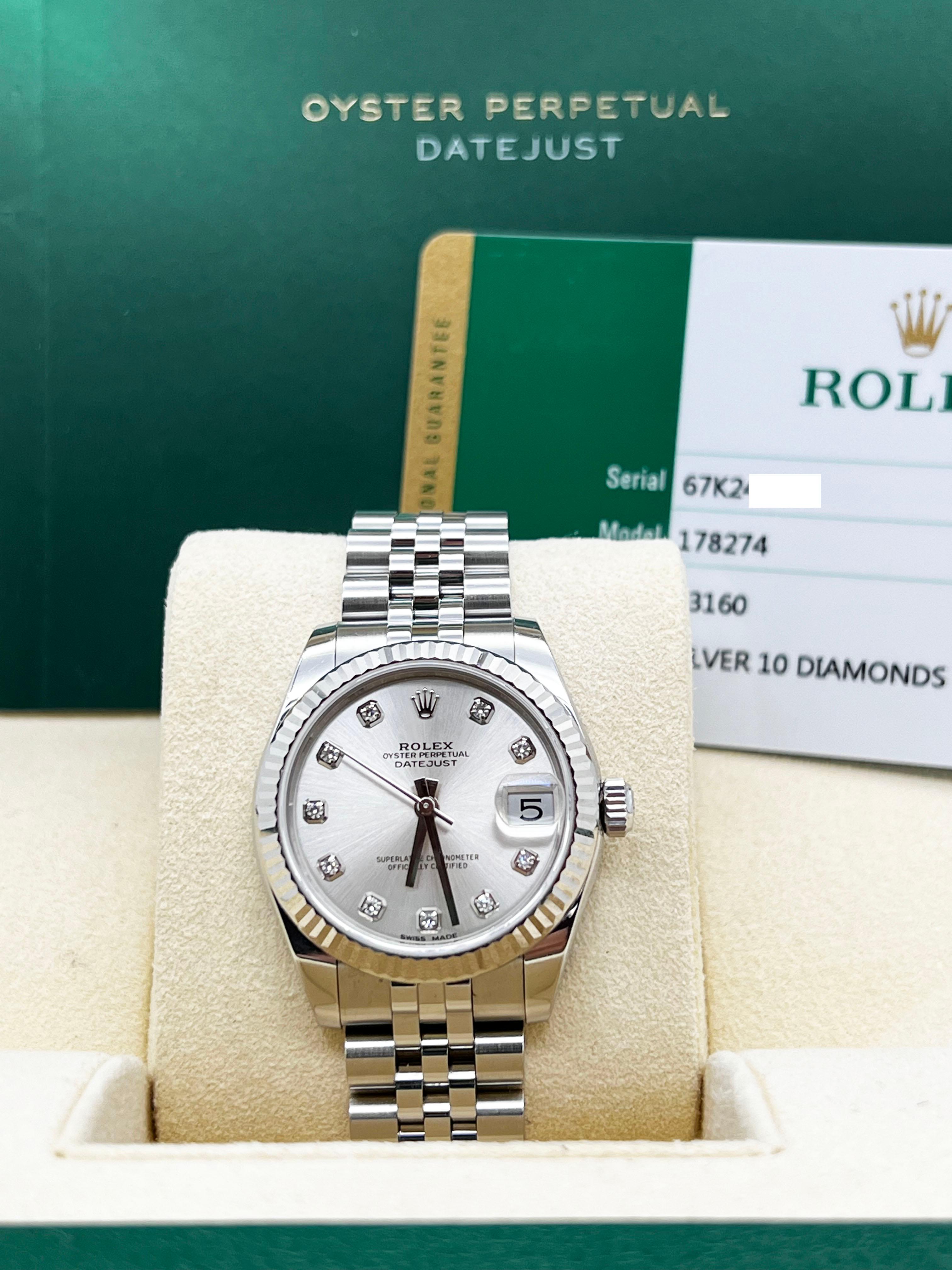 Style Number: 178274 Midsize



Serial: 67K24***



Year: 2019

 

Model: Datejust

 

Case Material: Stainless Steel 

 

Band: Stainless Steel 

 

Bezel: 18K White Gold Fluted Bezel 

 

Dial: Original Factory Silver Diamond Dial 

 

Face: