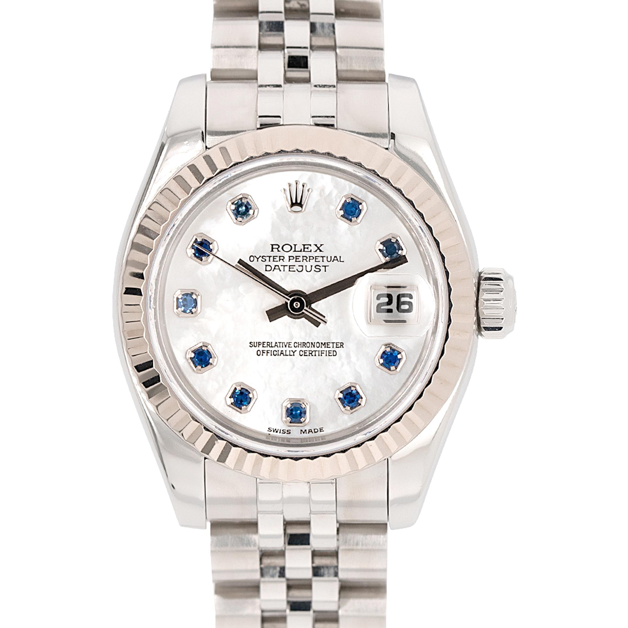 Brand: Rolex
MPN: 179174NGS
Model: Datejust
Case Material: Stainless steel
Case Diameter: 26mm
Crystal: Scratch resistant sapphire
Bezel:: 18k white gold bezel
Dial: Mother of pearl dial with sapphire hour markers and silver hands. Date can be found