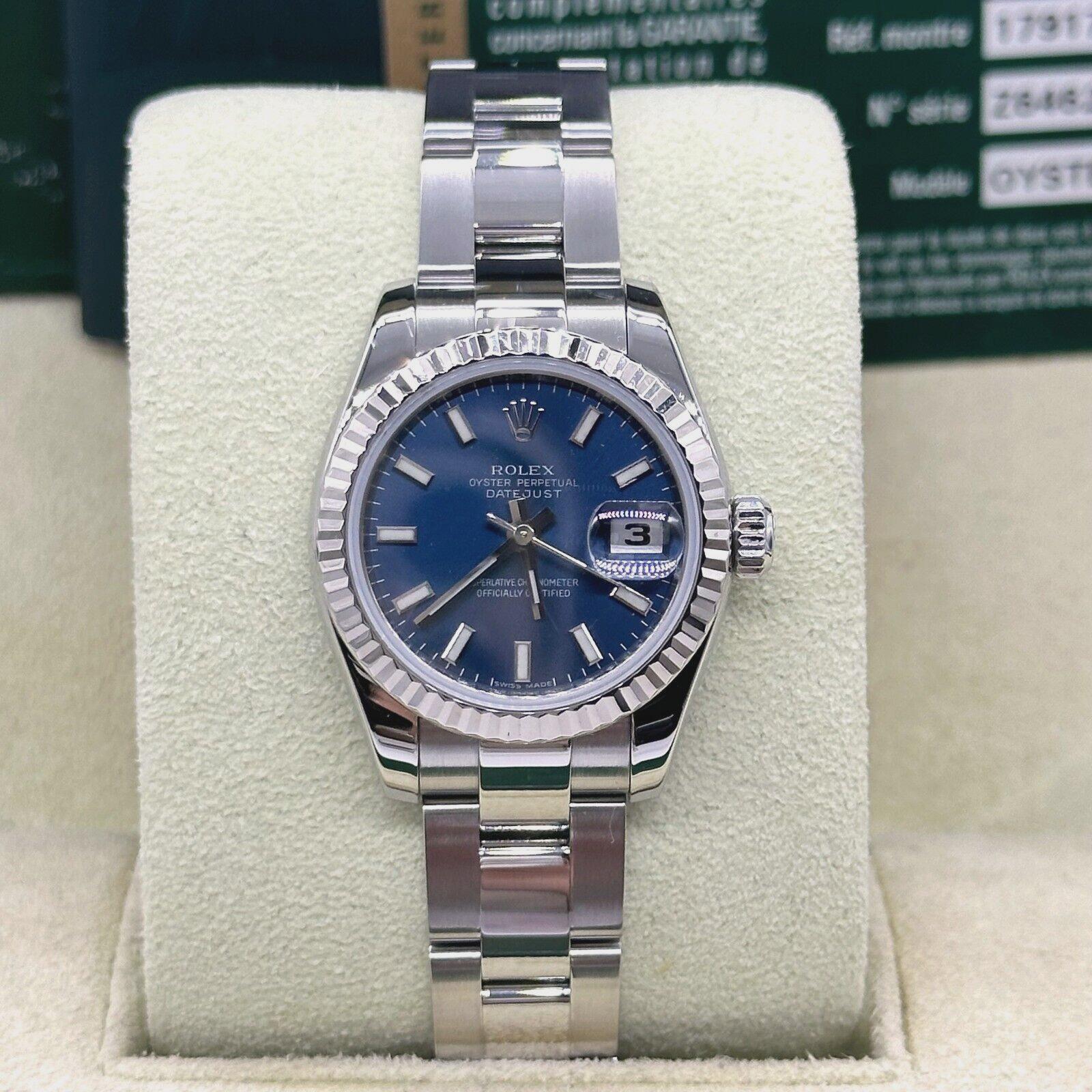 Style Number: 179174
Serial: Z646***
Year: 2010
Model: Ladies Datejust 
Case Material: Stainless Steel 
Band: Stainless Steel 
Bezel: 18K White Gold 
Dial: Blue 
Face: Sapphire Crystal 
Case Size: 26mm  

Includes: 

-Rolex Box & Paper

-Certified