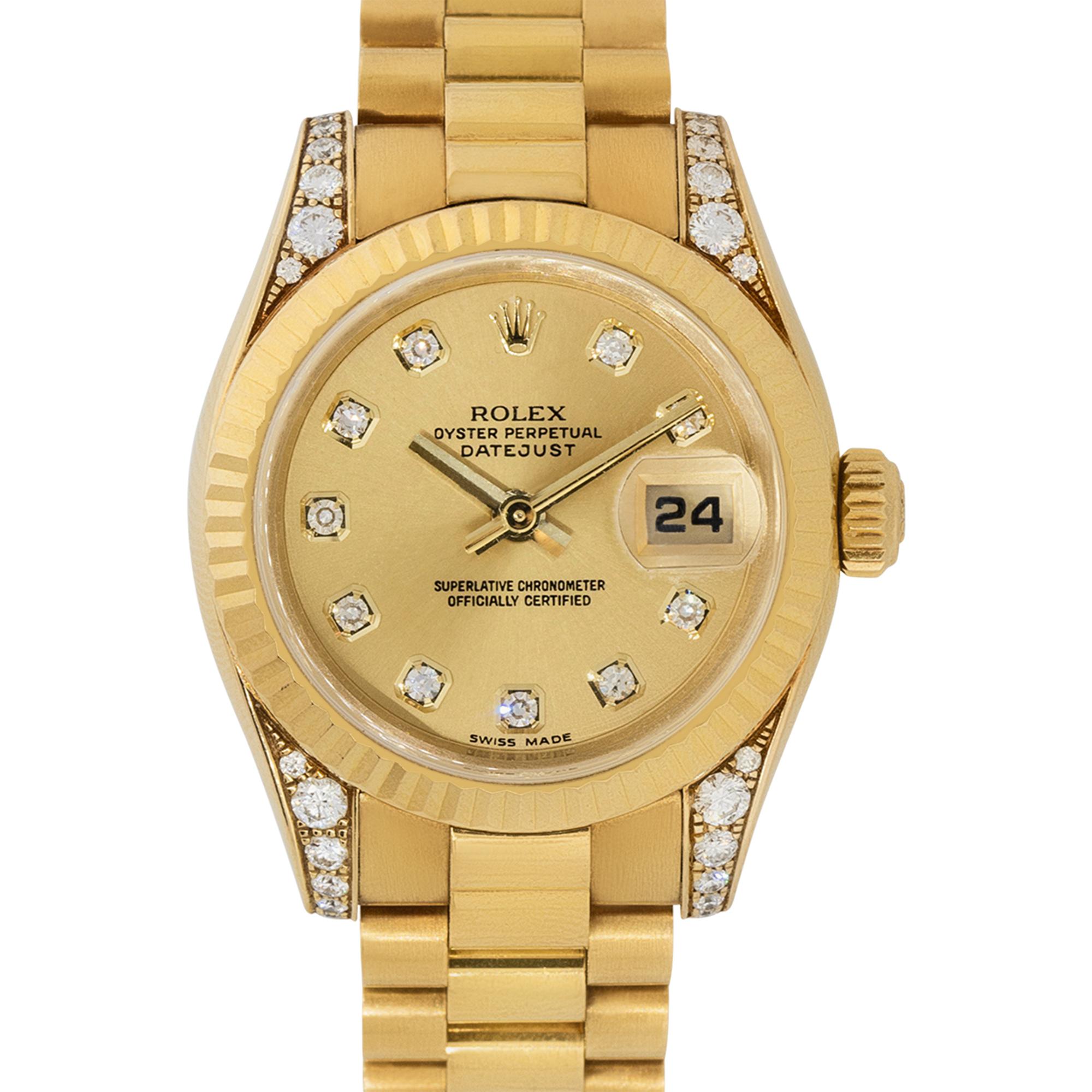 Brand: Rolex
MPN: 179238
Model: Datejust
Case Material: 18k Yellow Gold with Diamonds
Case Diameter: 26 mm
Bezel: 18k Yellow Gold Fluted bezel
Dial: Champagne dial with Diamond hour markers and yellow gold hands. Date can be found at 3