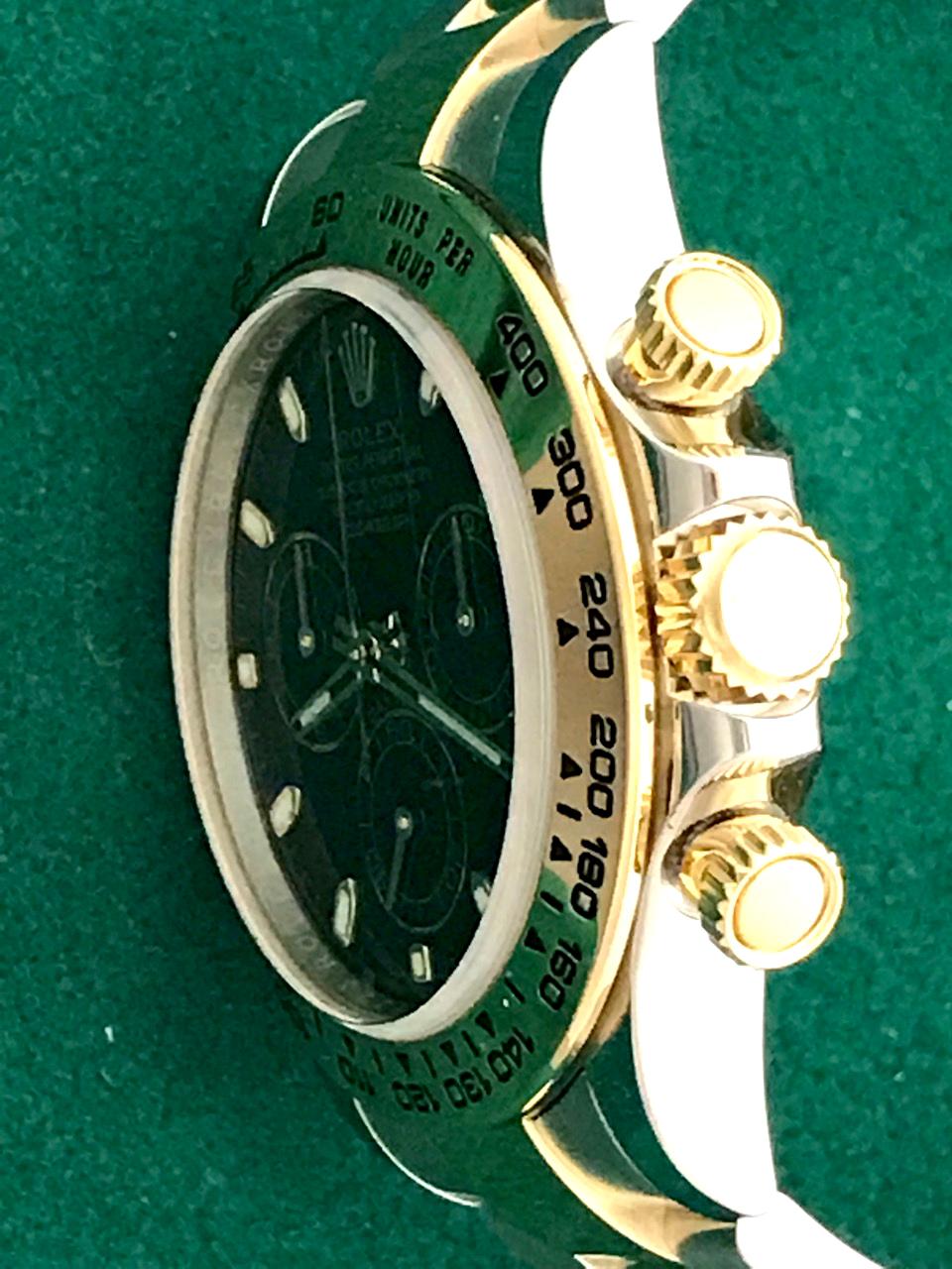 Rolex 18 Karat Gold Stainless Steel Daytona Black Dial Automatic Wristwatch In Excellent Condition In Dallas, TX