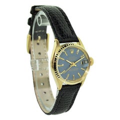 Rolex Montre Oyster Perpetual en or 18 carats avec cadran bleu d'origine rare, pour femmes