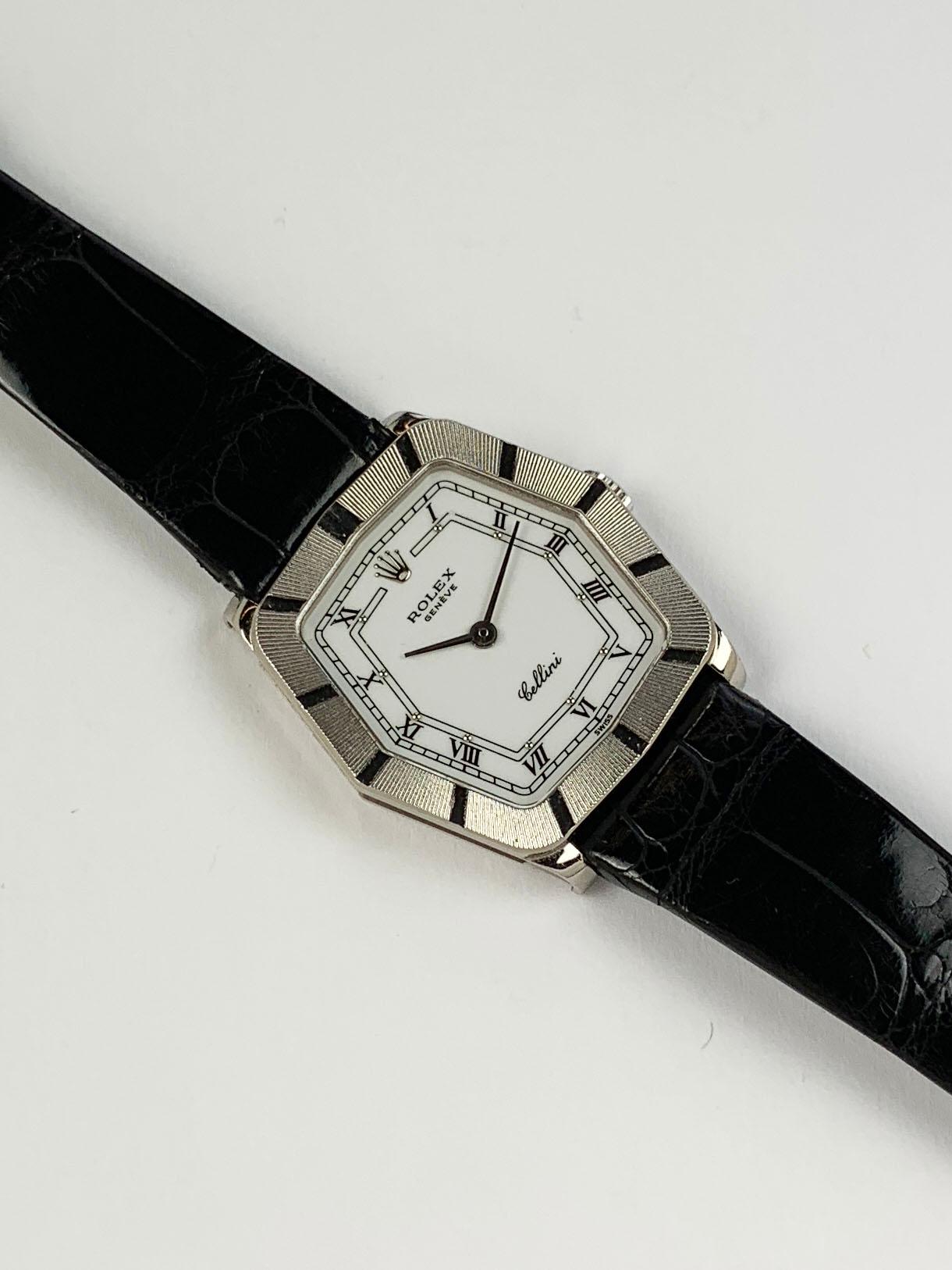 Rolex Cellini 18K White Gold Manual Wind Wristwatch
Factory White Enamel Decorated Dial with Applied Rolex Crown and Roman Numerals
Solid 18K White Gold Case 
24mm x 24mm
Rolex Manual Wind  Movement
Sapphire Crystal
1995 Production
Comes Fitted on
