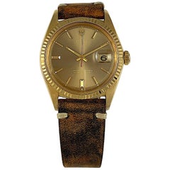 Vintage Rolex 18 Karat Yellow Gold Datejust Taupe Mirror Dial Wristwatch, 1960s