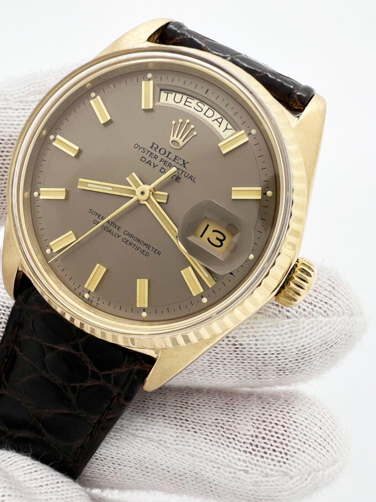 Style Number: 1803

Serial: 2568668

Year: 1970
 
Model: President Day Date
 
Case Material: 18K Yellow Gold Case
 
Band: Brown Leather Band 
 
Bezel: 18K Yellow Gold 
 
Dial: Rare Bronze Pie Pan With 