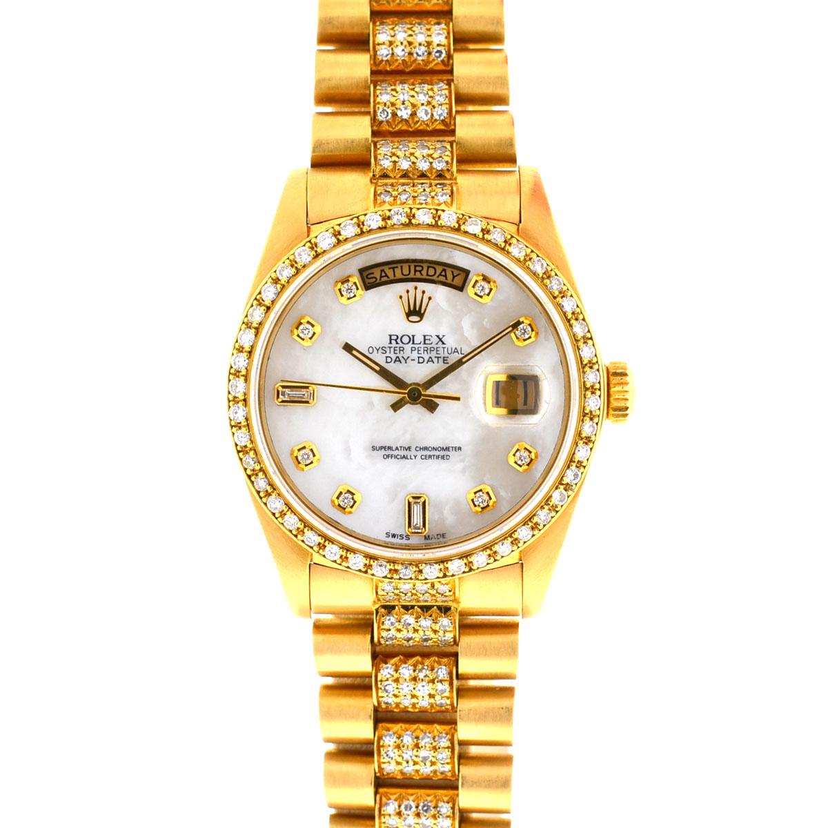 Company - Rolex
Model - 18038 Day-Date Single Quick President
Case Metal - 18k Yellow Gold
Case Measurement - 36mm
Bracelet - Custom 18k Yellow Gold & Diamonds- Fits Wrist Size - 7.5