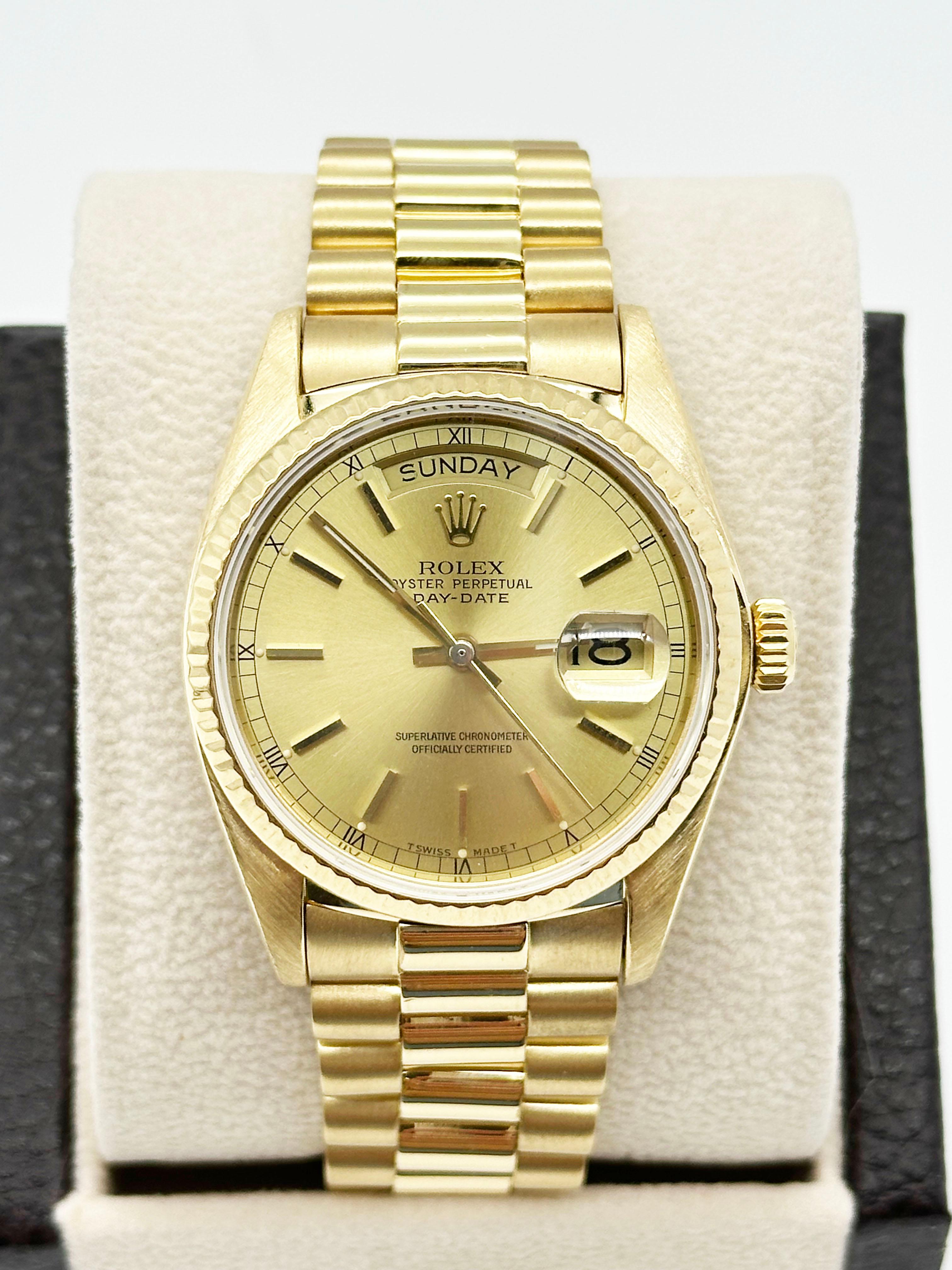 Style Number: 18038
Serial: 6154***
Year: 1979
Model: Rolex President Day Date 
Case Material: 18K Yellow Gold 
Band:  18K Yellow Gold 
Bezel: 18K Yellow Gold Fluted Bezel 
Dial: Champagne Dial 
Face: Sapphire Crystal 
Case Size: 36mm 
Includes: