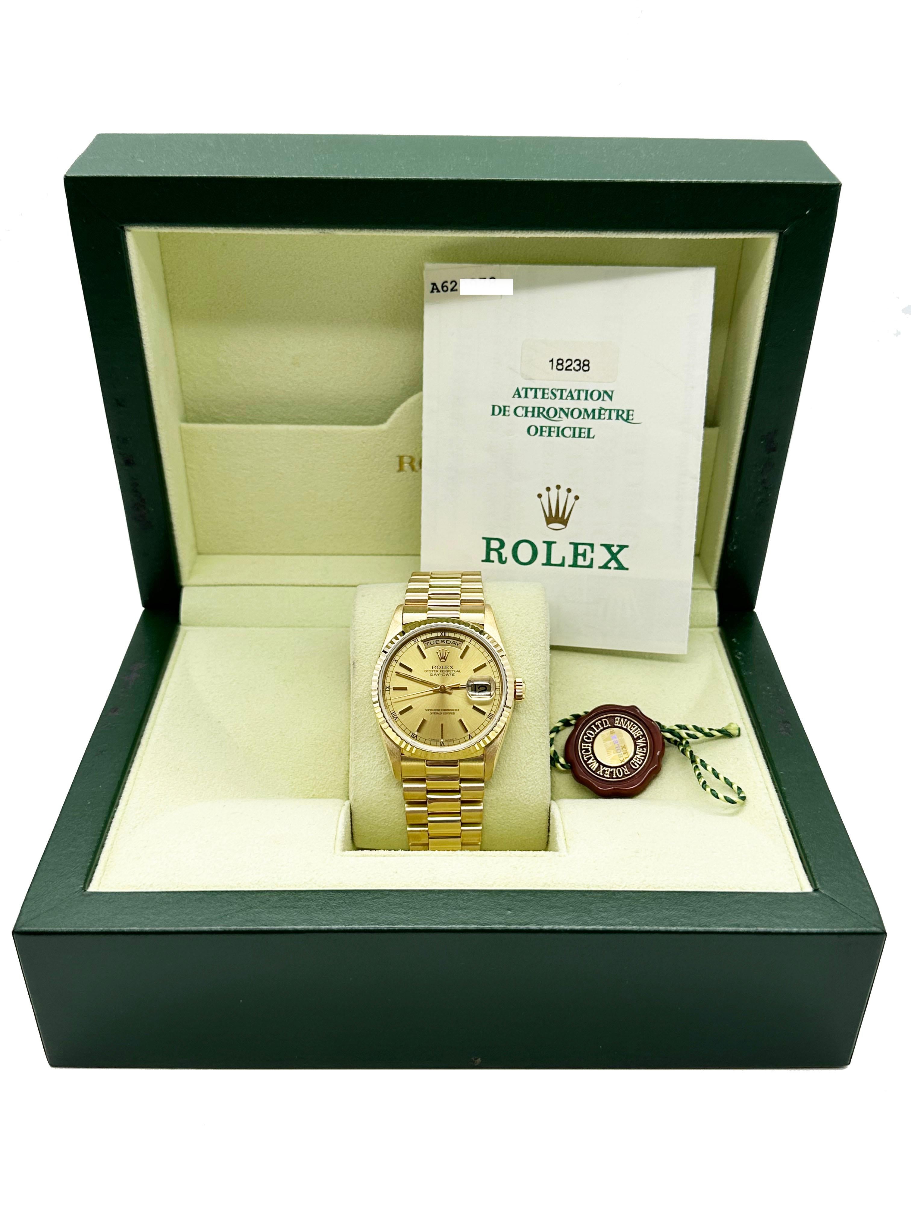 Style Number: 18238
Serial: A620***
Year: 2000
Model: President Day Date Double Quickset 
Case Material: 18K Yellow Gold 
Band: 18K Yellow Gold 
Bezel: 18K Yellow Gold 
Dial: Champagne 
Face: Sapphire Crystal 
Case Size: 36mm
Includes: 
-Rolex Box &