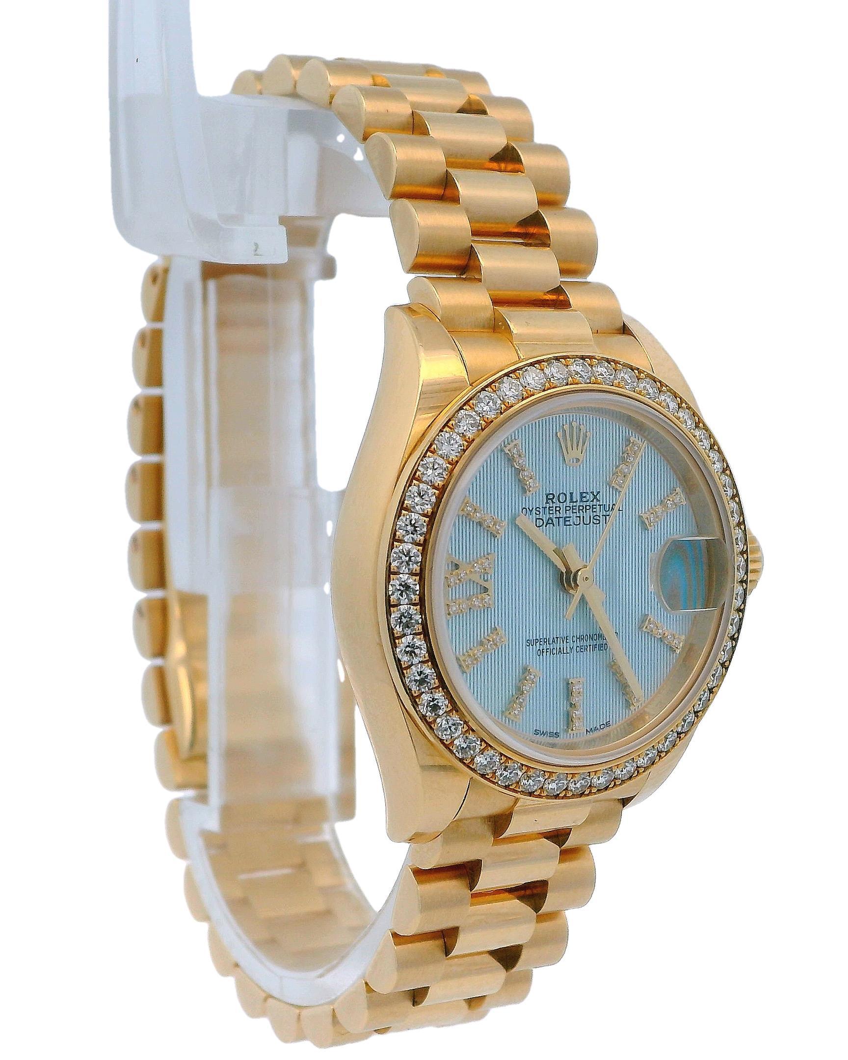 Rolex Datejust 279138 RBR ladies' watch. It features a 28mm 18K yellow gold case and an 18K yellow gold bezel set with factory diamonds. The watch has a blue dial, gold hands, and factory diamonds on the gold index marking the hour positions. The