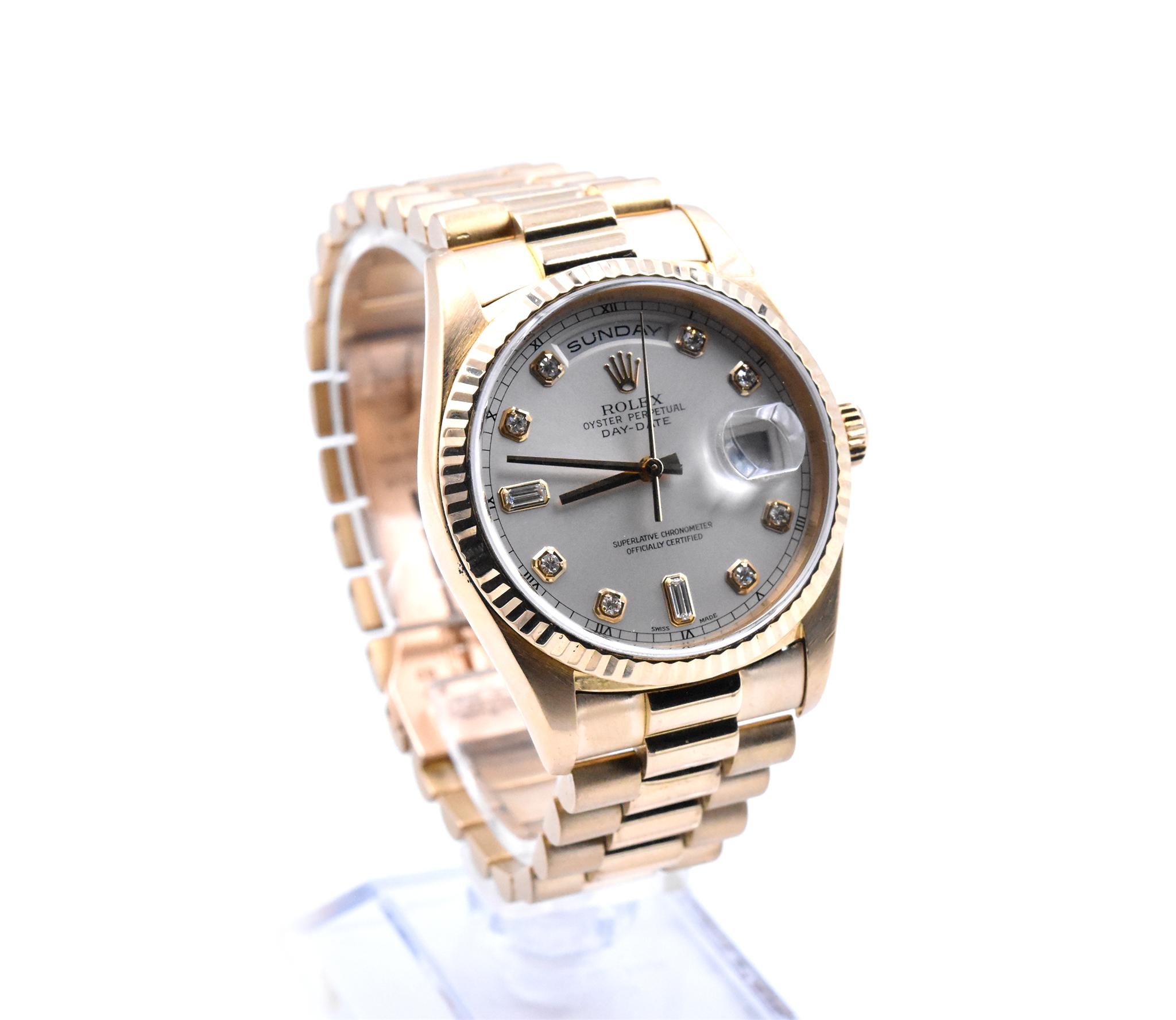 Movement: automatic
Function: seconds, minutes, hours, day, date
Case: 36mm 18k yellow gold case,fluted bezel, scratch resistant sapphire crystal
Band: 18k yellow gold Rolex President bracelet
Dial: factory diamond dial with round and baguettes,