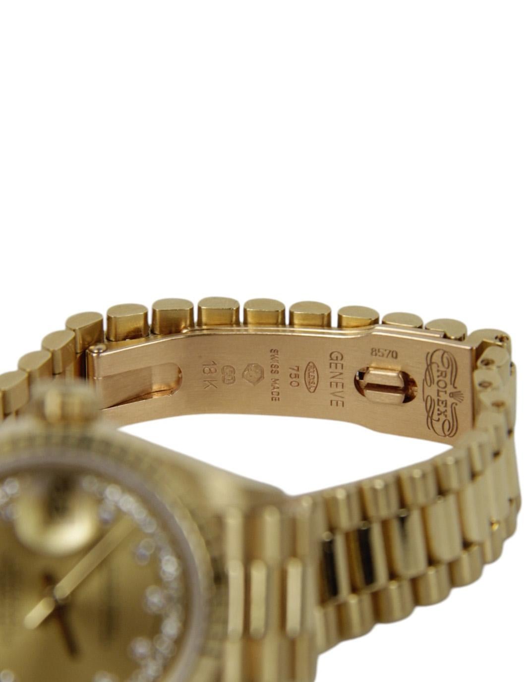 Rolex 18K Yellow Gold Diamond 26mm Datejust President Watch 69178. Features champagne dial with diamond markers and diamonds bordering dial. 

Materials: 18k yellow gold and diamonds
Movement: Automatic
Model Name: Datejust 69178
Overall Condition: