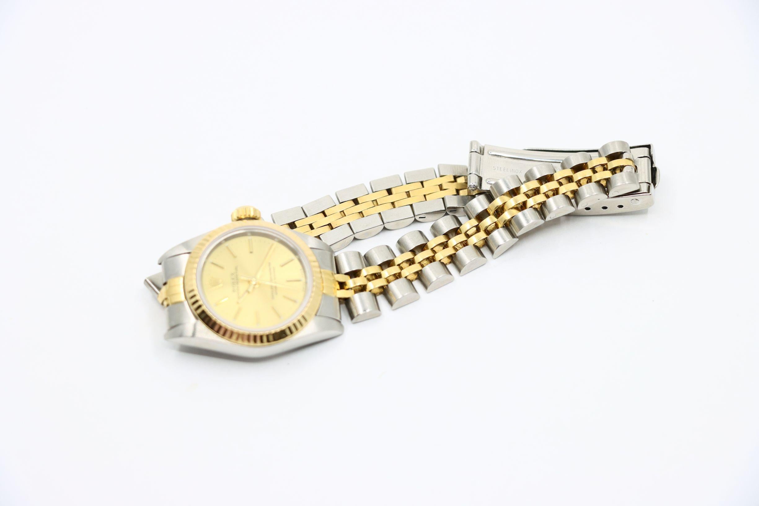 Rolex Montre Oyster Perpetual en or 18 carats pour femmes en vente 6