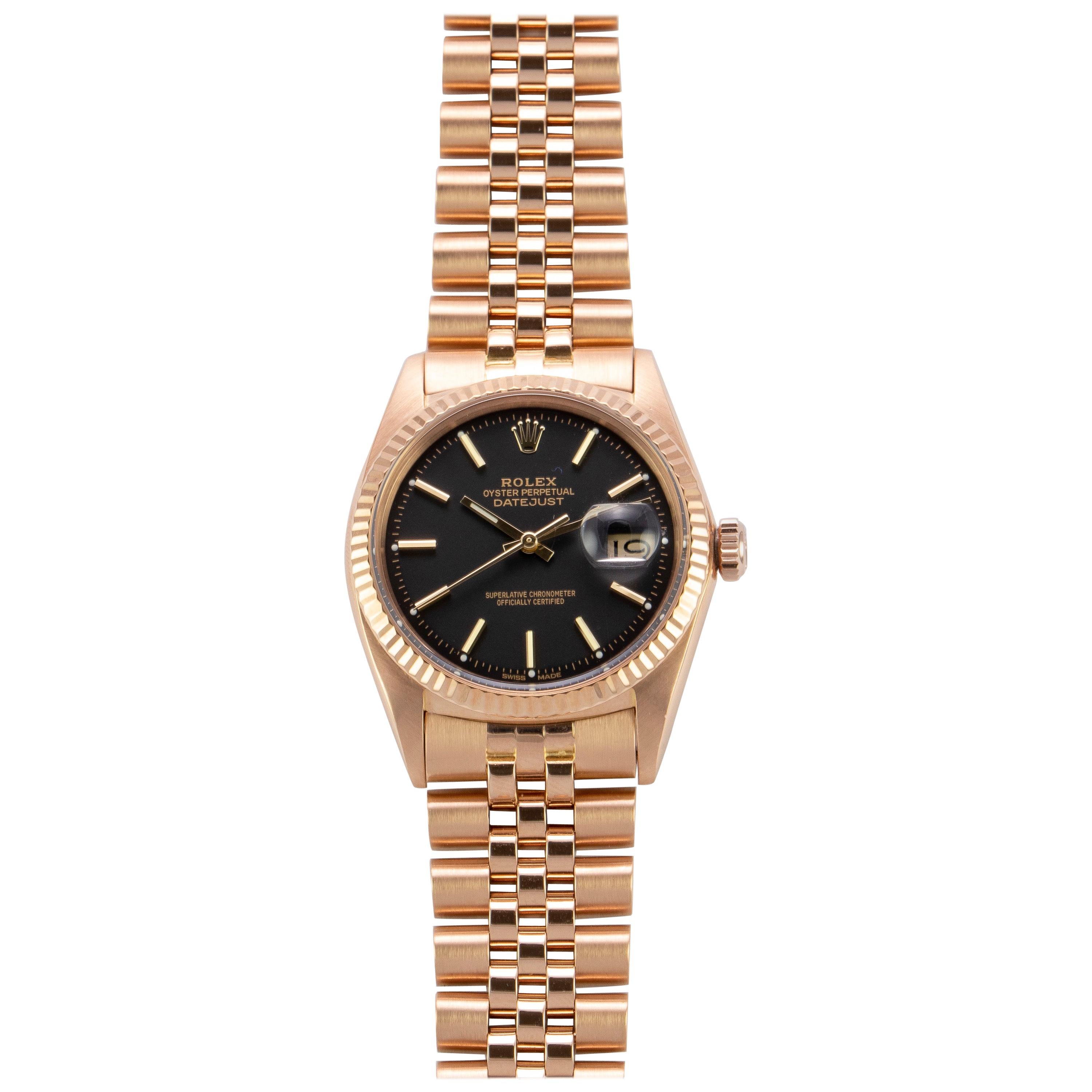 Rolex 18 Karat Rose Gold Oyster Perpetual Datejust Watch with Black Dial, 1970s For Sale
