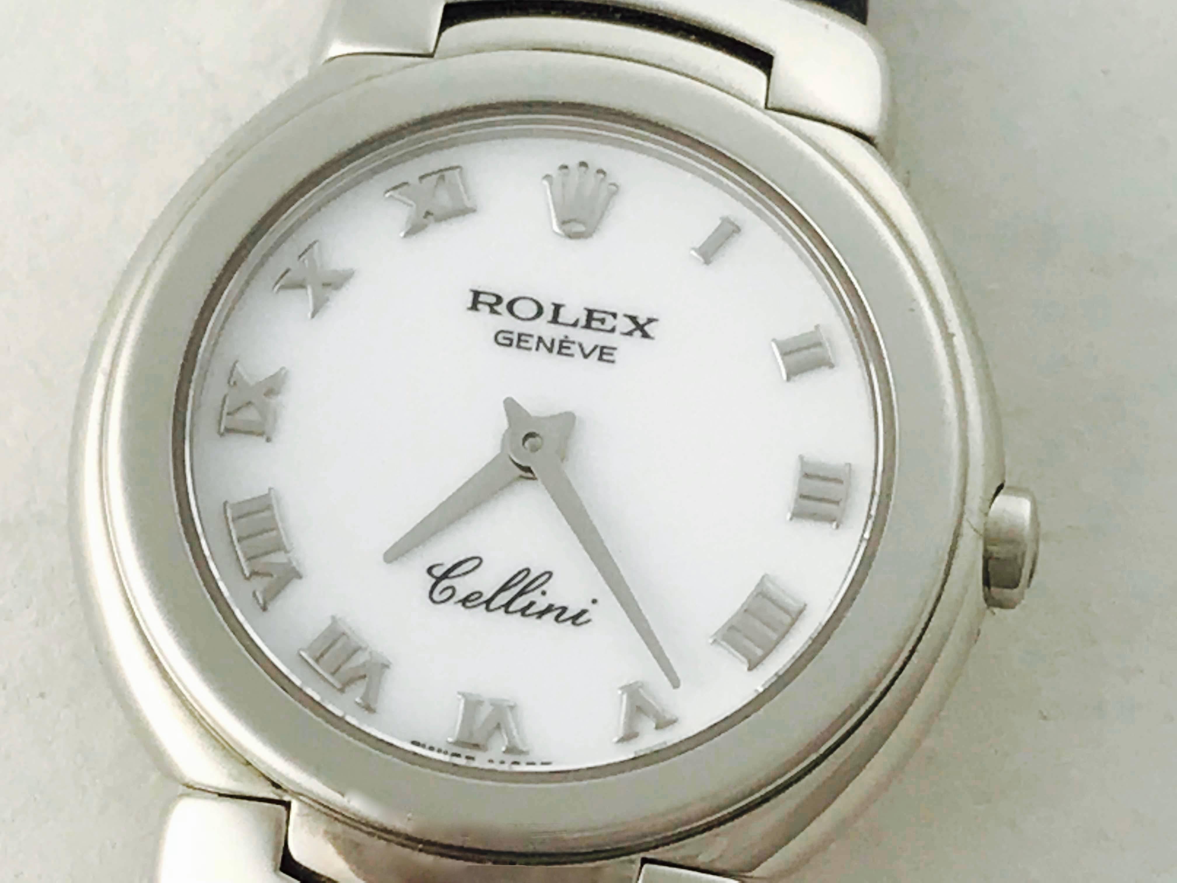 Rolex Cellini Model 6621/9 ladies Pre Owned Quartz wrist watch.
White Dial with polished Roman numerals. 18k White Gold round style case (25mm). Black strap with 18k White Gold Rolex deployant clasp. Rolex box, papers and booklet included. Inventory