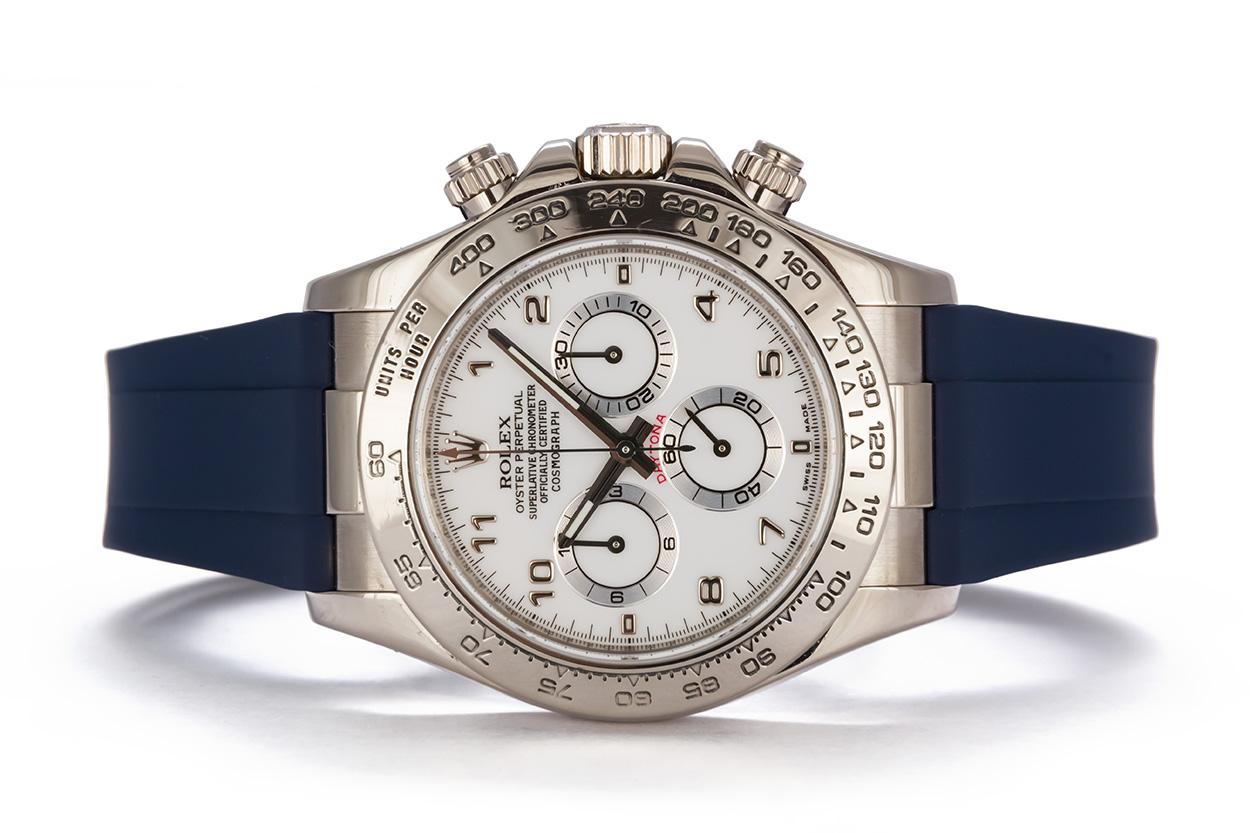 We are pleased to offer this 2006 18k White Gold Rolex Daytona Chronograph 116519. The Daytona will always be one of the most coveted Rolex watches. This watch features classic white dial and comes on a brand new unworn blue Rubber B strap. It will
