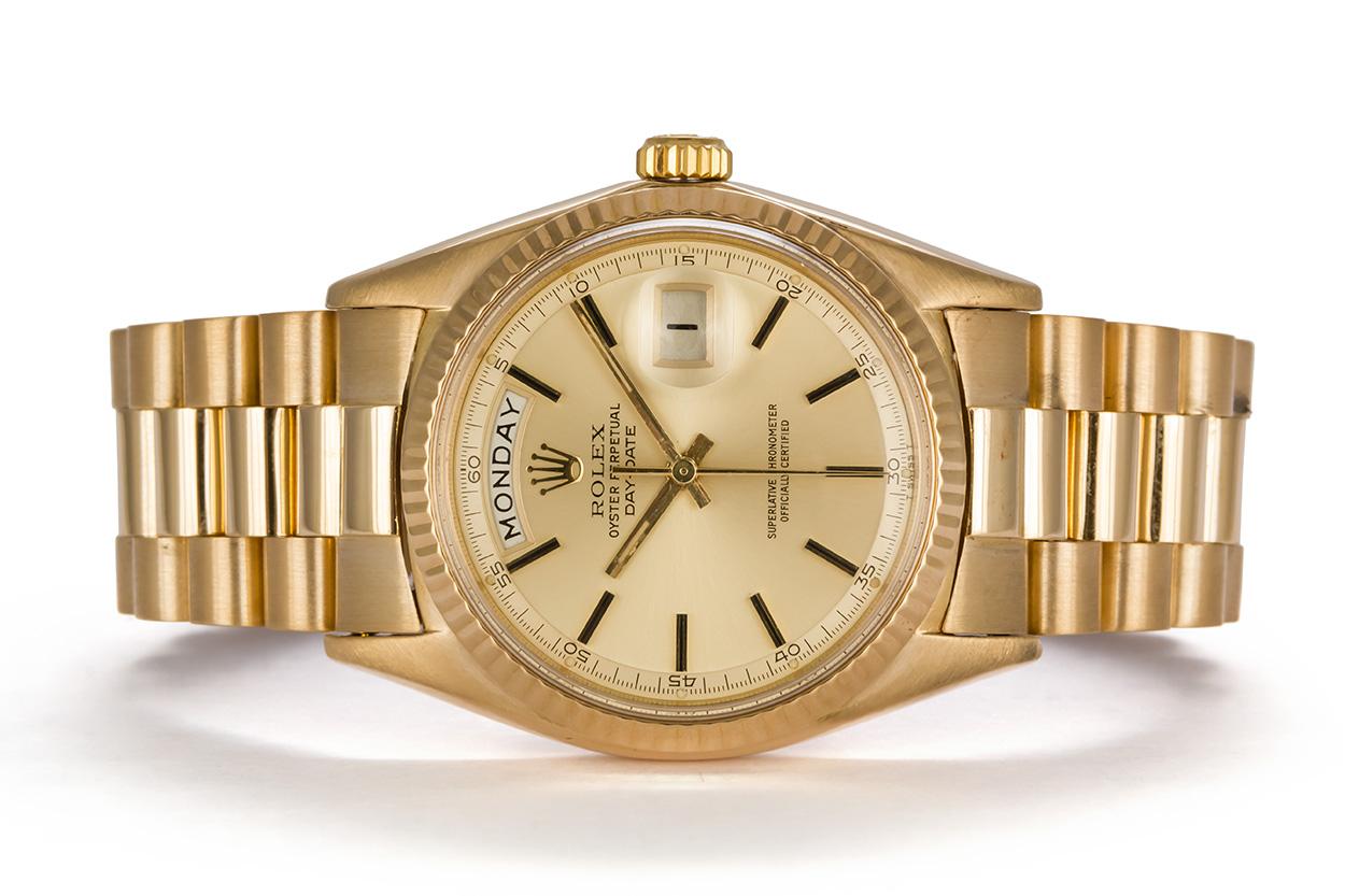 We are pleased to offer this Rolex 18k Yellow Gold Day-Date 36mm President 1803 Non-Quick. This classic mens Rolex Day-Date dress watch is in excellent condition and was recently fully serviced by our master watchmaker. It is 100 percent authentic