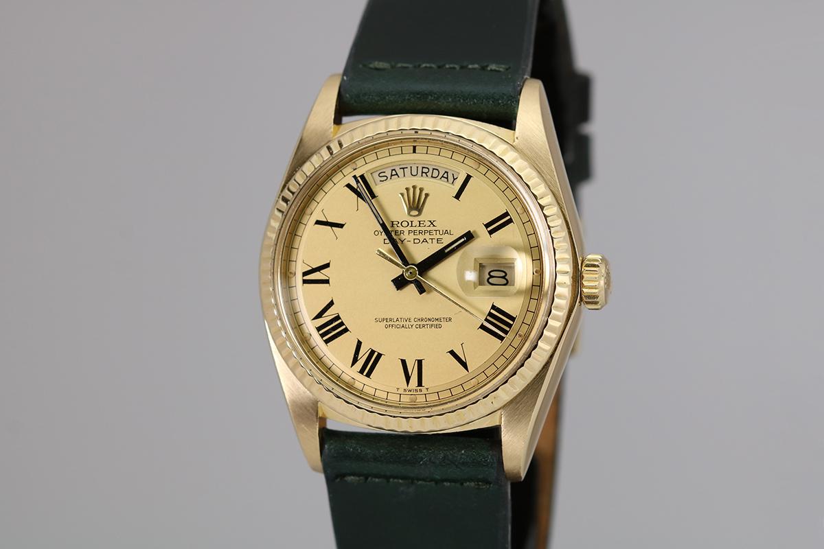 This is a lovely solid 18kt yellow gold Rolex Day-Date Reference 1803 from 1973.  What makes this watch special is its original 