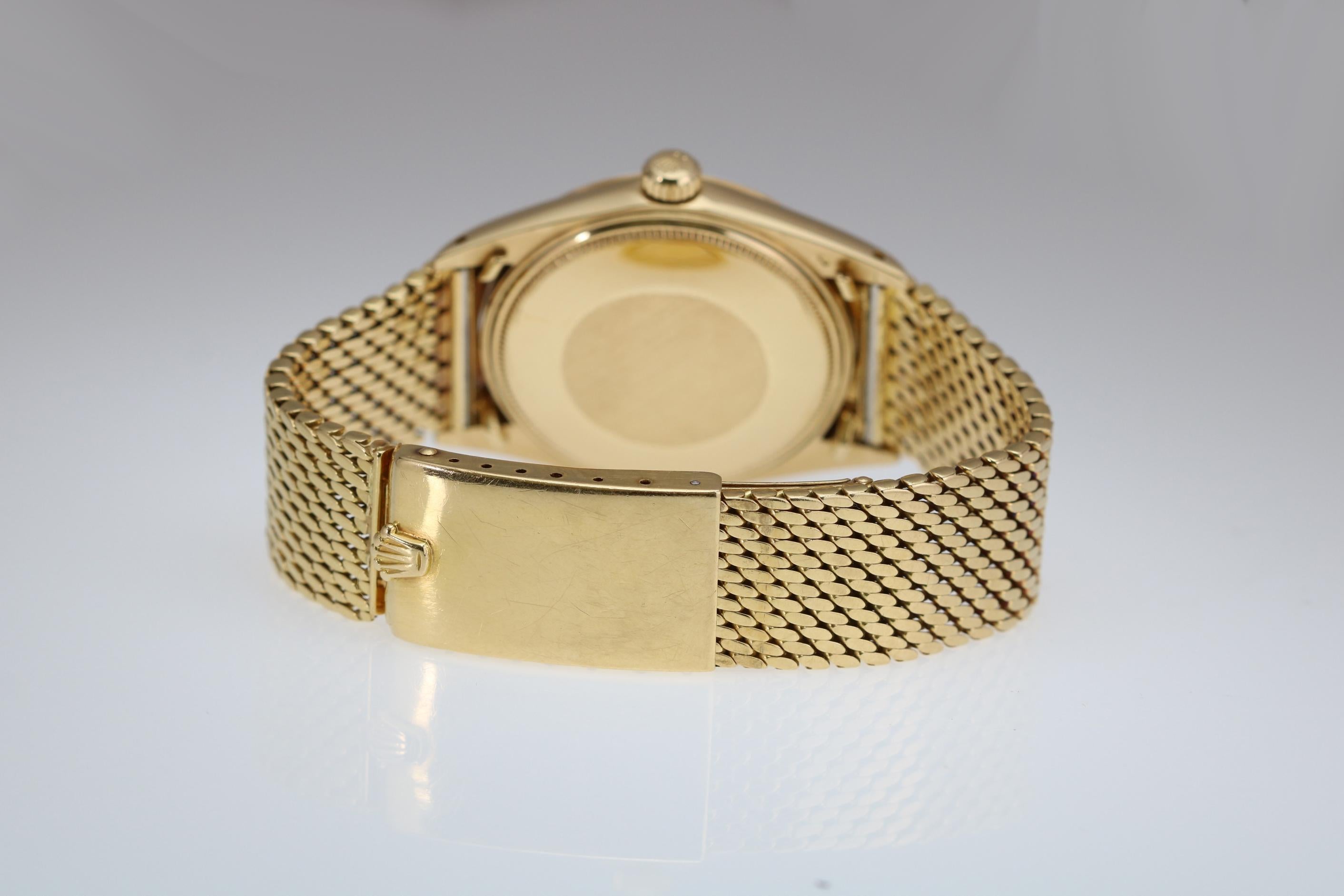 Rolex 18 Karat Yellow Gold Date Ref 1500 on Rolex Gold Mesh Bracelet, circa 1969 In Good Condition In Miami Beach, FL