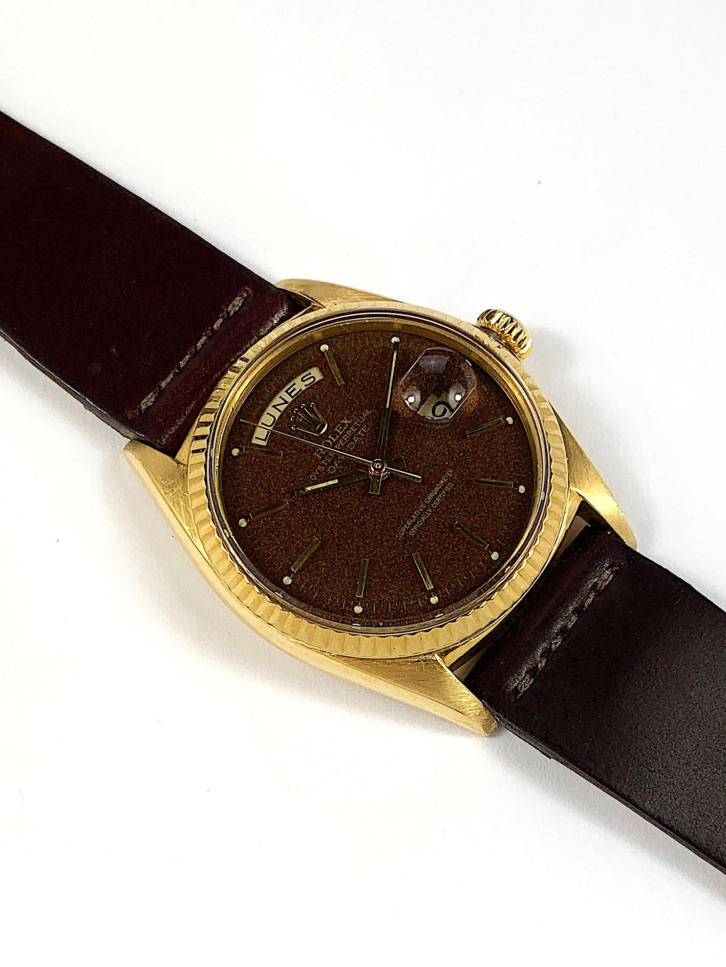Rolex 18K Yellow Gold Day-Date  Watch from the 1960s
Beautiful Factory Brown Velvet Confetti Dial with Specks of Color Under Magnification
Very Unusual and Rare Dial
Yellow Gold  Fluted Bezel
18K Yellow Gold Case
36mm in size 
Features Rolex
