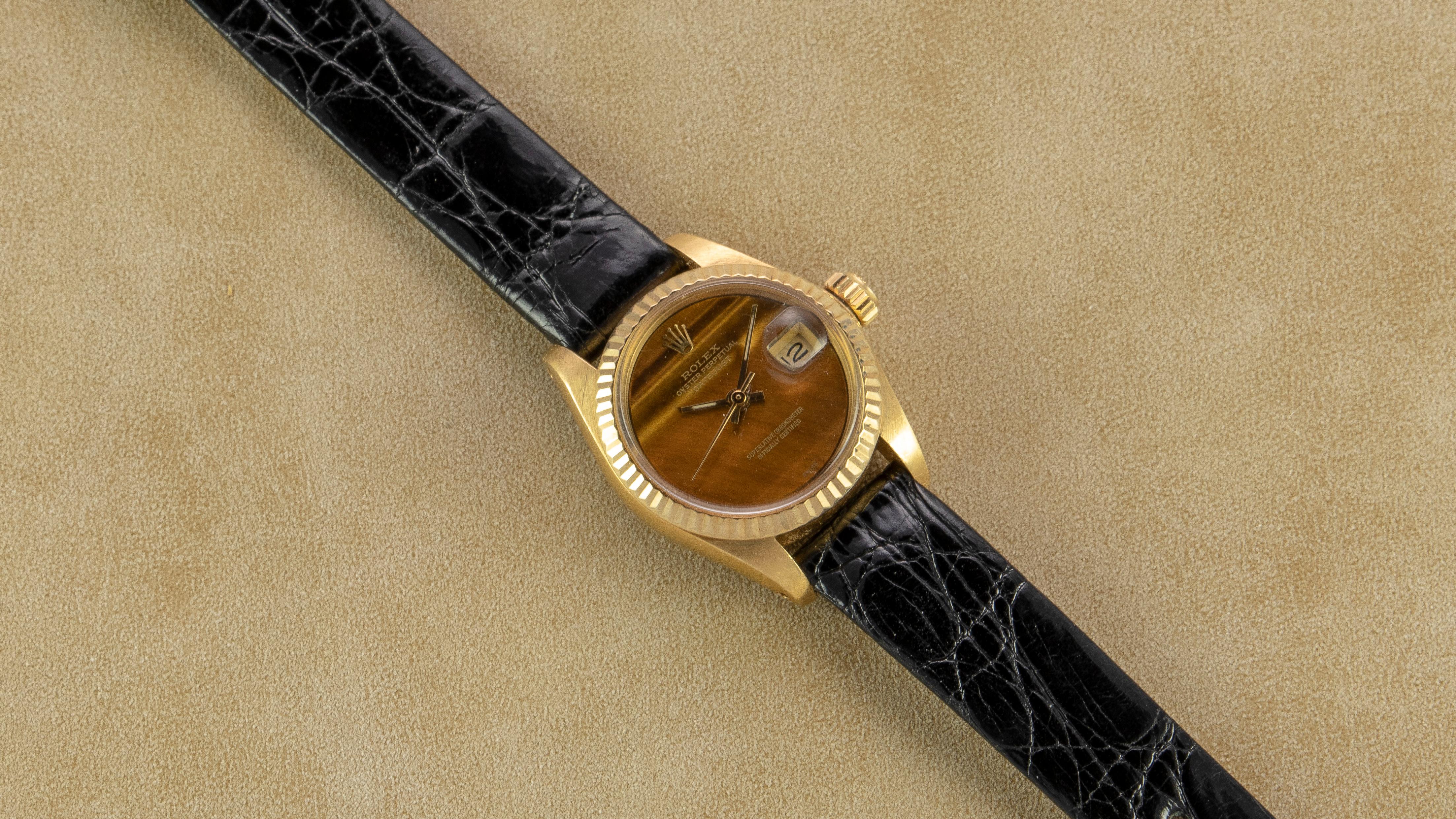 Confident. Bold. Sporty.

Rolex 18K Yellow Gold Ladies Oyster Perpetual Datejust with Factory Tiger's Eye Dial

The Rolex Ladies Oyster Perpetual Datejust is timeless. It exudes femininity, confidence, and a playful side. The distinct look of this