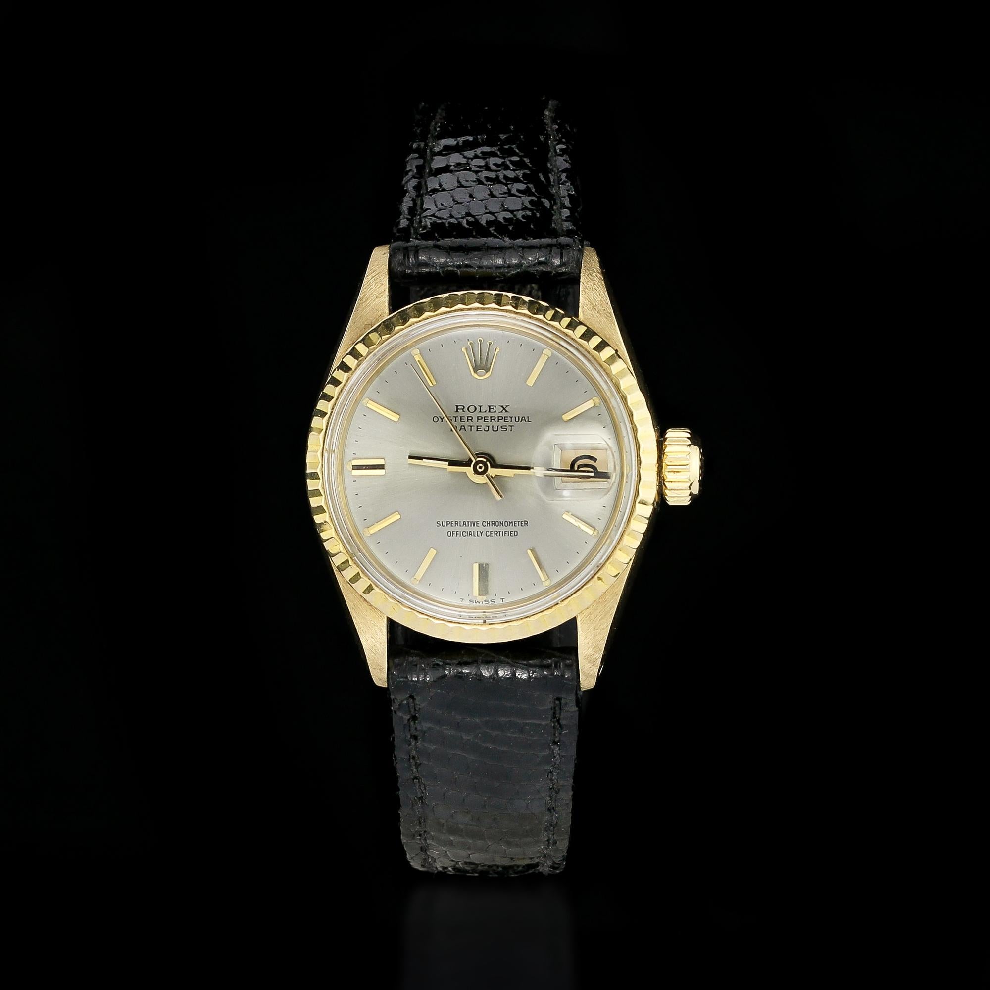 Rolex 18kt gold ladies datejust ref 6517-8. Early model from 1969 and has rare silver dial.
Circa 1969

Gender:   Ladies
Model : Ladies DateJust
Case Diameter : 24 mm
Movement: Automatic
Watchband Material: original Rolex leather strap
Case material