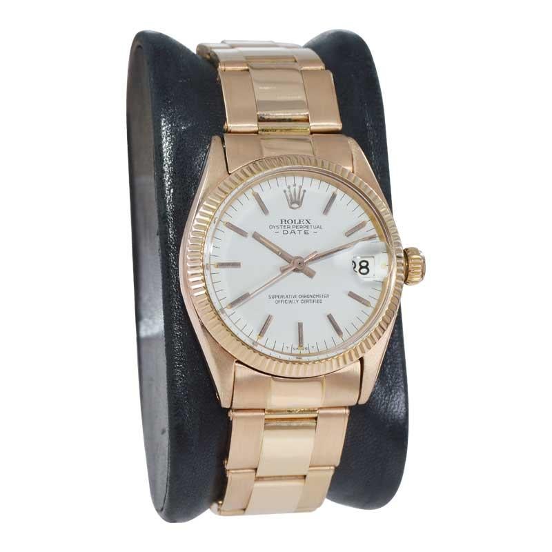 FACTORY / HOUSE: Rolex Watch Company
STYLE / REFERENCE: Oyster Perpetual Date / Reference 8627
METAL / MATERIAL: 18 Kt. Rose Gold 
DIMENSIONS: Length 36mm  X Diameter 30mm
CIRCA: 1962 / 63
MOVEMENT / CALIBER: Perpetual Winding / 26 Jewels 
DIAL /