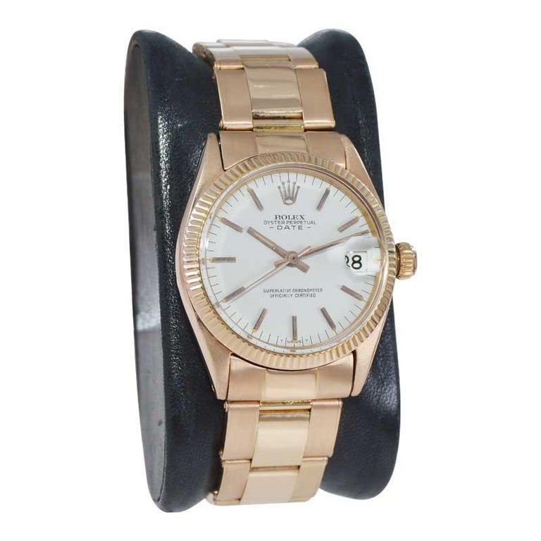 FACTORY / HOUSE: Rolex Watch Company
STYLE / REFERENCE: Oyster Perpetual Date / Ref. 8627
METAL / MATERIAL: 18 Kt. Rose Gold 
DIMENSIONS:  36 mm  X  30 mm
CIRCA: 1962/63
MOVEMENT / CALIBER: Perpetual Winding / 26 Jewels 
DIAL / HANDS: Original,