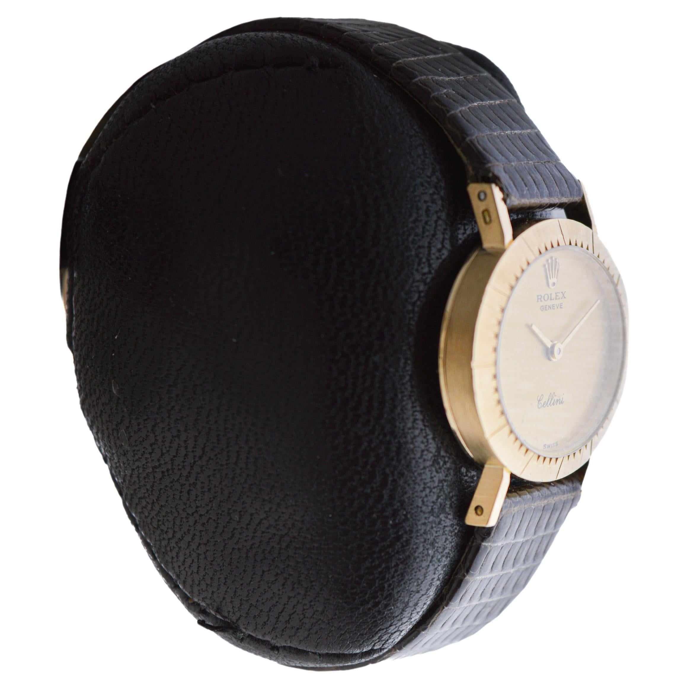 FACTORY / HOUSE: Rolex Watch Company
STYLE / REFERENCE: Cellini / Reference 4081
METAL / MATERIAL: 18Kt Solid Yellow Gold
CIRCA / YEAR: 1980's
DIMENSIONS / SIZE: Length 29mm X Diameter 25mm
MOVEMENT / CALIBER: Manual Winding / 19 Jewels 
DIAL /