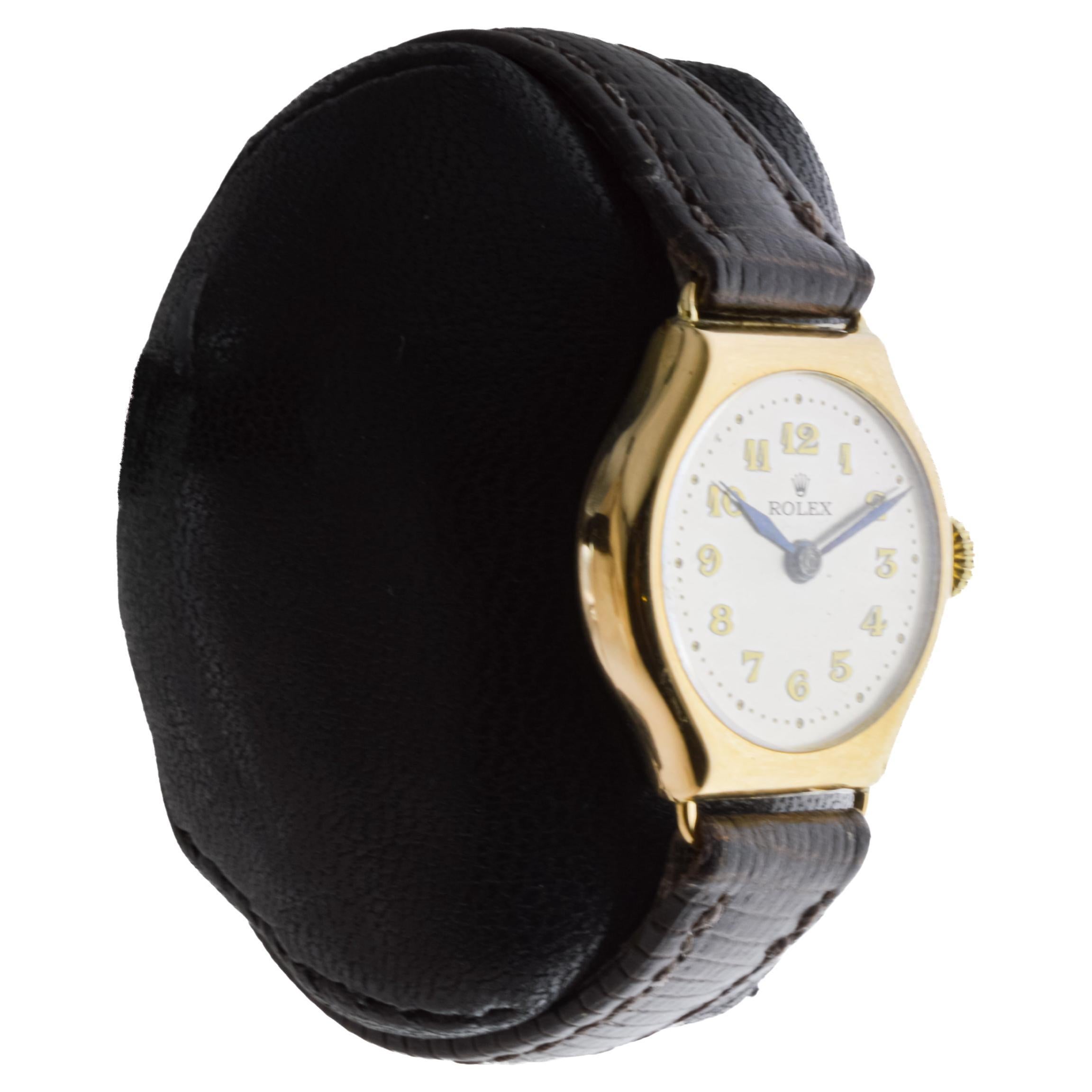 FACTORY / HOUSE: Watch Company
STYLE / REFERENCE: Tortue / Reference 6875
METAL / MATERIAL: 18Kt Solid Gold
CIRCA / YEAR: circa 1915
DIMENSIONS / SIZE: Length 29mm X Diameter 24mm
MOVEMENT / CALIBER: Manual Winding / 15 Jewels / Caliber 9 3/4
DIAL /
