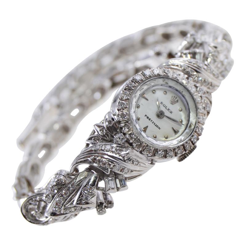 Moderniste Rolex 18kt. Montre de soirée pour femme en or blanc massif avec diamants, circa années 1950 en vente