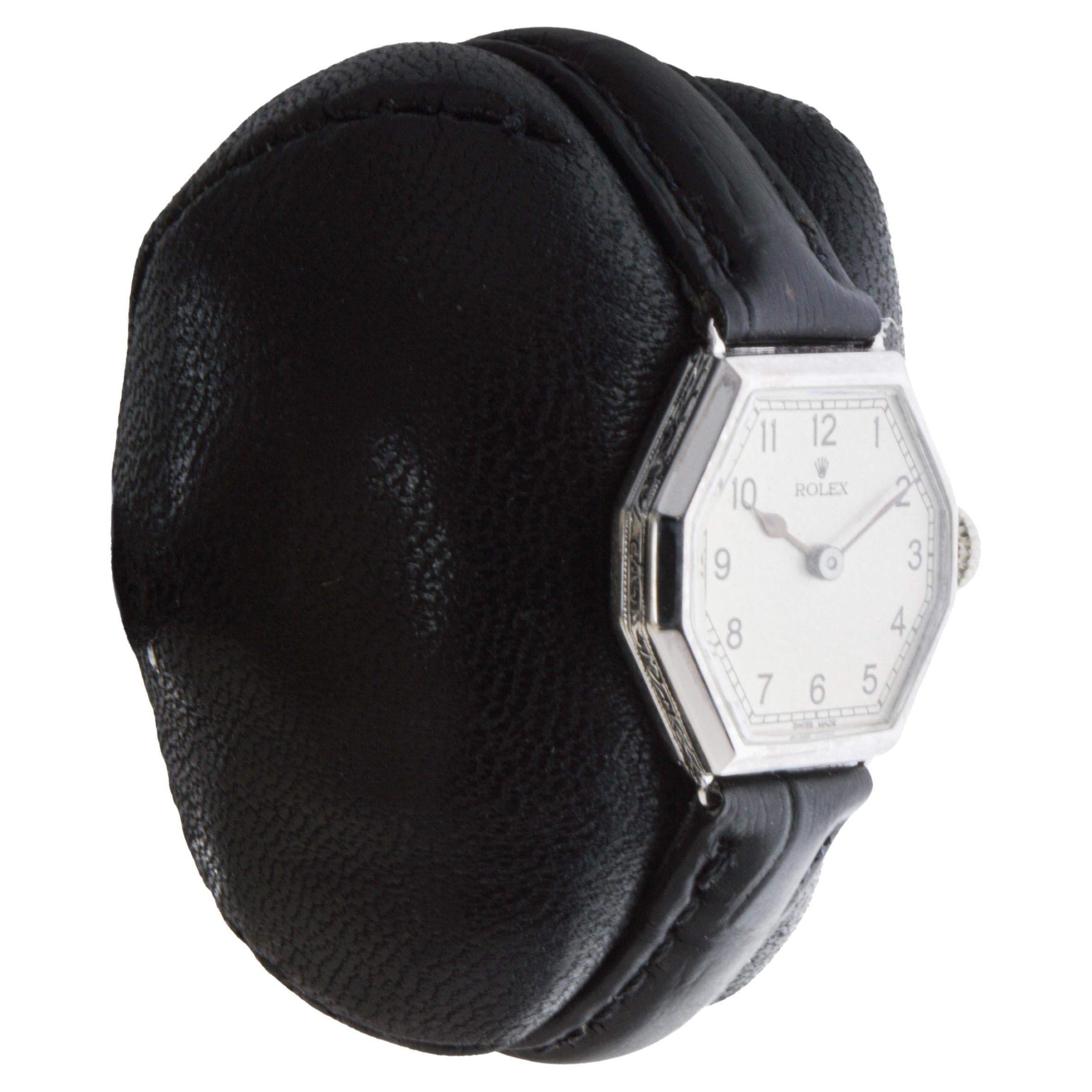 FACTORY / HOUSE: Rolex Watch Company
STYLE / REFERENCE: Art Deco / Octagon Shape
METAL / MATERIAL: 18Kt Solid White Gold
CIRCA / YEAR: 1927-26
DIMENSIONS / SIZE: Length 25mm X Width 21mm
MOVEMENT / CALIBER: Manual Winding / 15 Jewels / Caliber 8