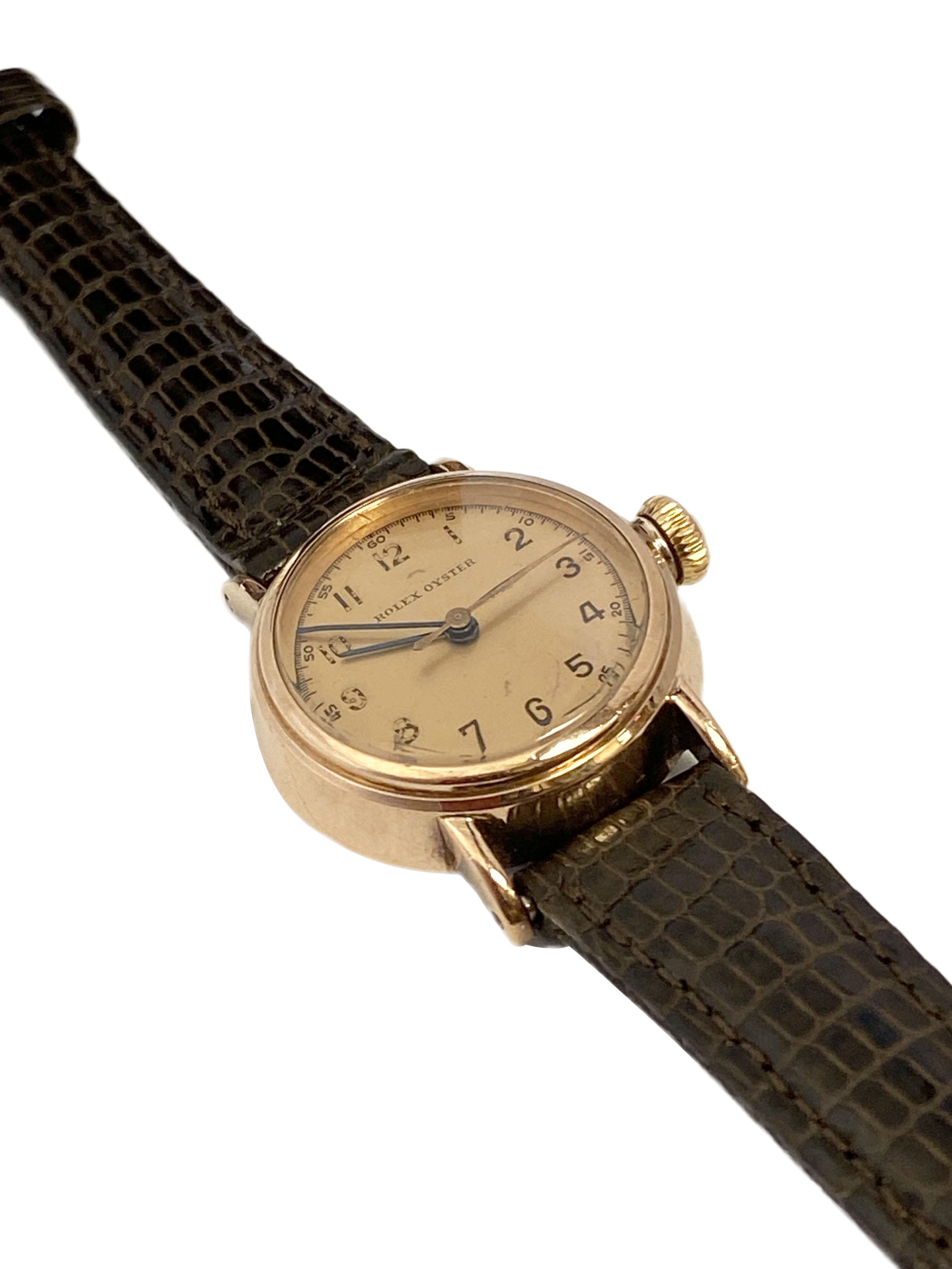 Circa 1930s Rolex Oyster Wrist Watch, 24 M.M. Rose Gold top with Steel back oyster Case and curved down Lugs. mechanical, manual wind movement, original screw down Oyster logo Crown, Original mint condition Rose color dial, Sweep seconds hand. New