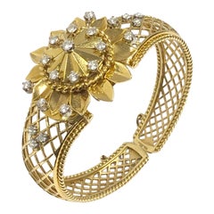 Rolex 1950s Ladies Yellow Gold and Diamond Covered Surprise Cuff Bracelet Watch