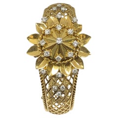 Rolex 1950er Jahre Damen Gelbgold und Diamant abgedeckte Surprise Manschette Armbanduhr 