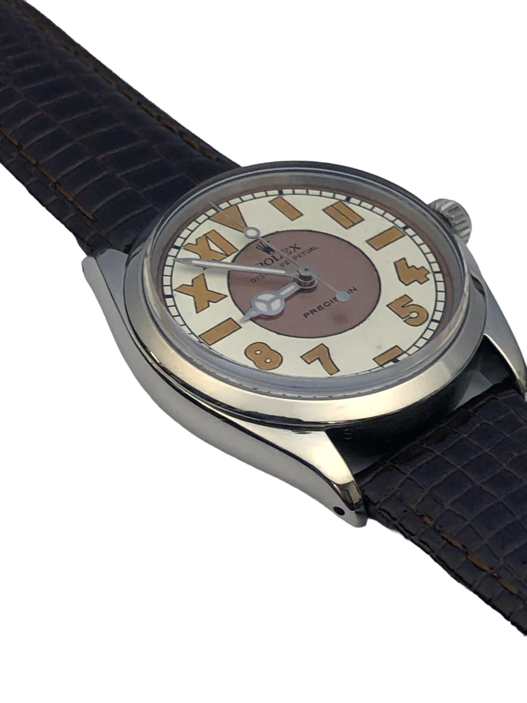 Circa 1958 Rolex Reference 1002 Wrist Watch, 34 M.M Stainless Steel 3 piece Oyster Case. Caliber 1560 Automatic, Self winding Movement.  Bubbleback 