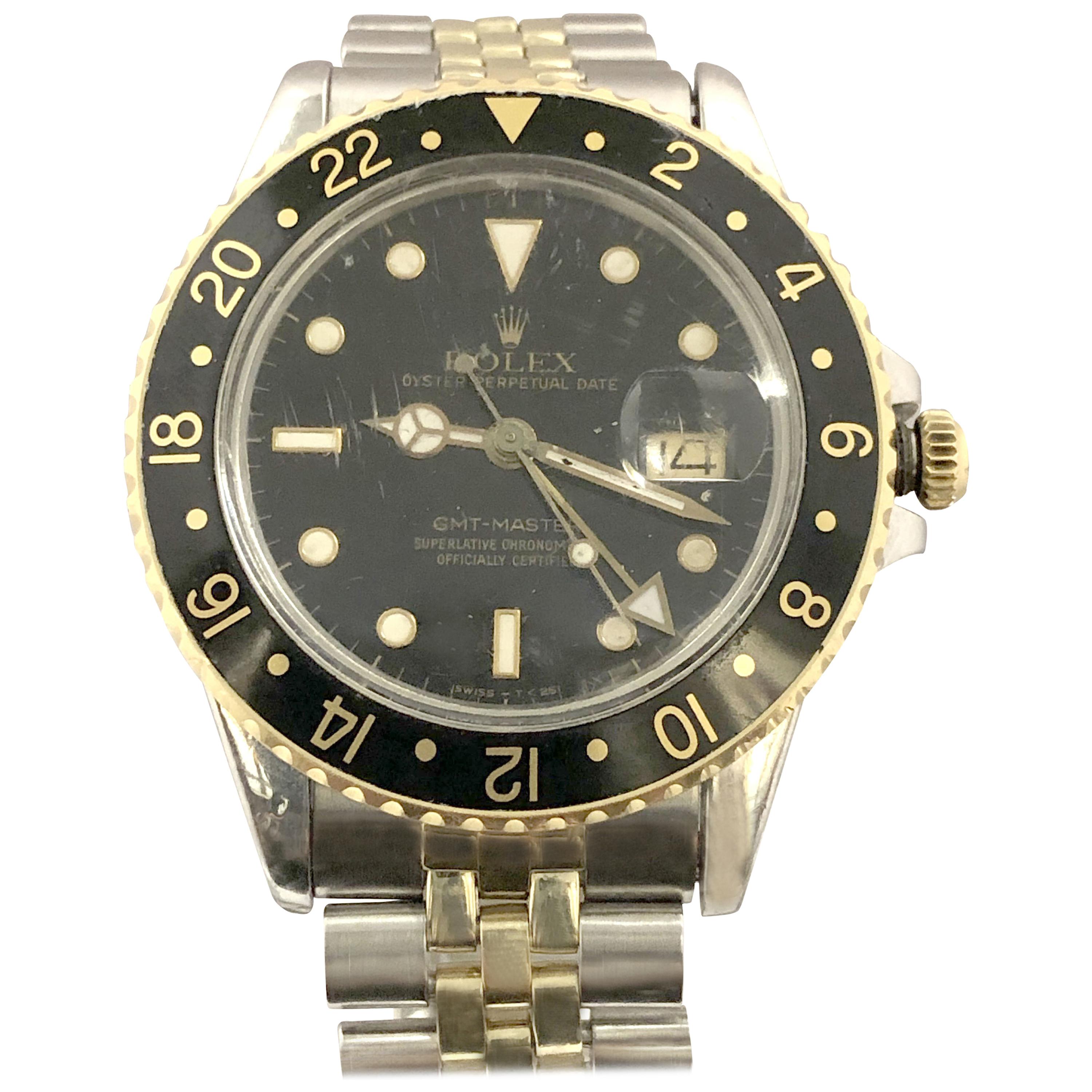 Rolex 1987 Referenz 16753 GMT Master Armbanduhr aus Gold und Stahl