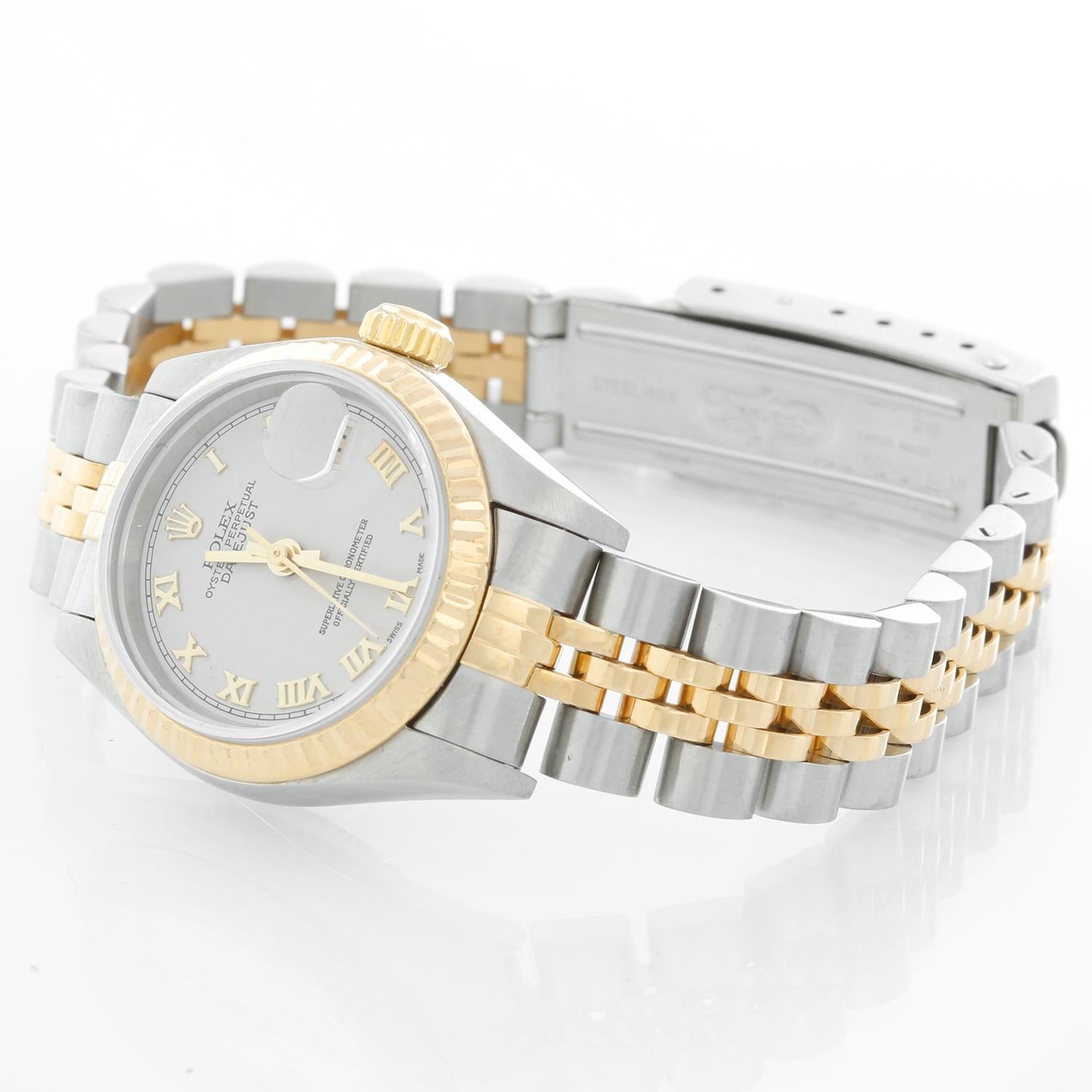 Rolex  2-Tone Datejust Steel & Gold Ladies Watch 69173 - Automatic winding, 29 jewels, Quickset date, sapphire crystal. Stainless steel case with 18k yellow gold fluted bezel . Cream Pyramid dial. Stainless steel and 18k yellow gold Jubilee